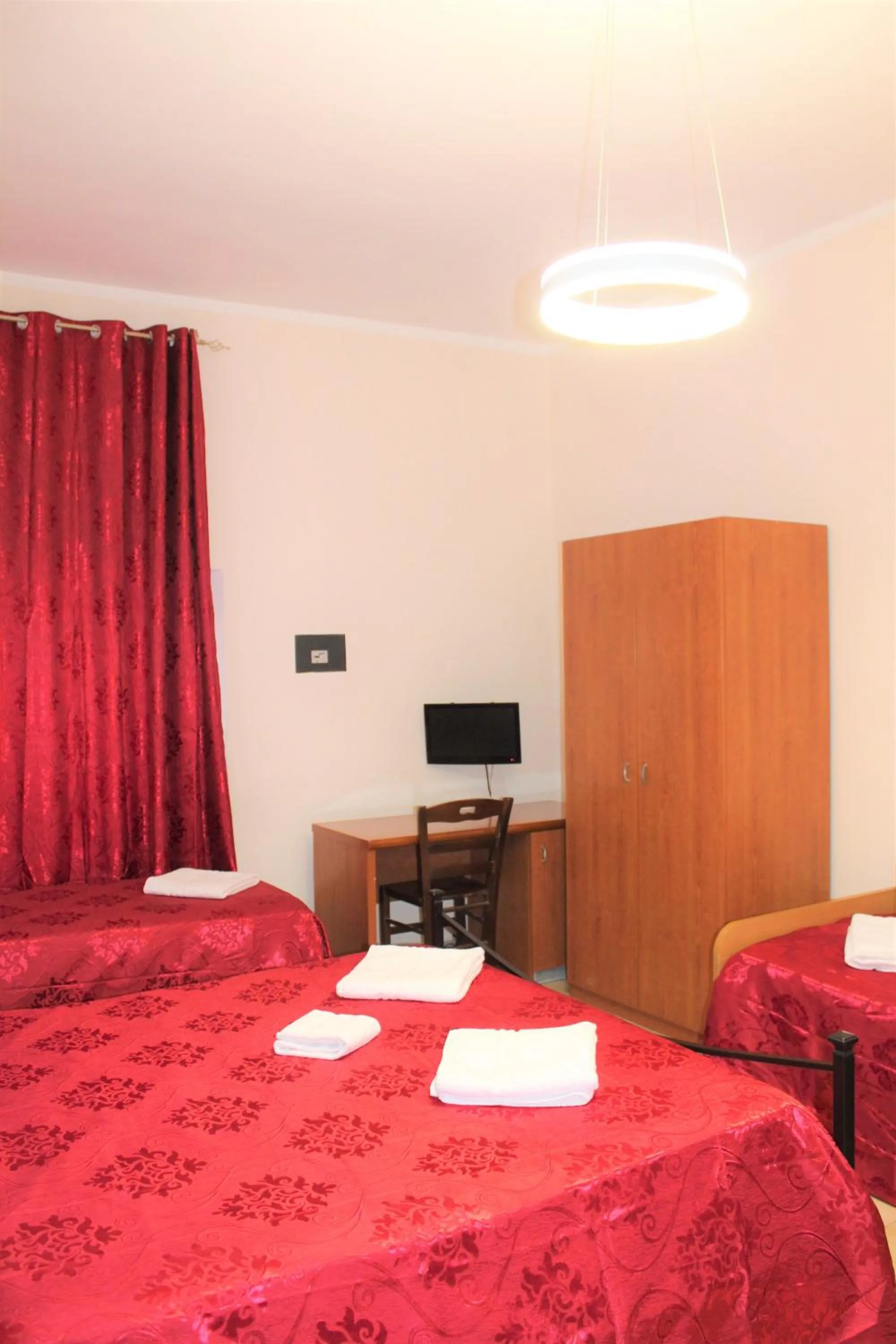 Bed in Hotel Eurorooms