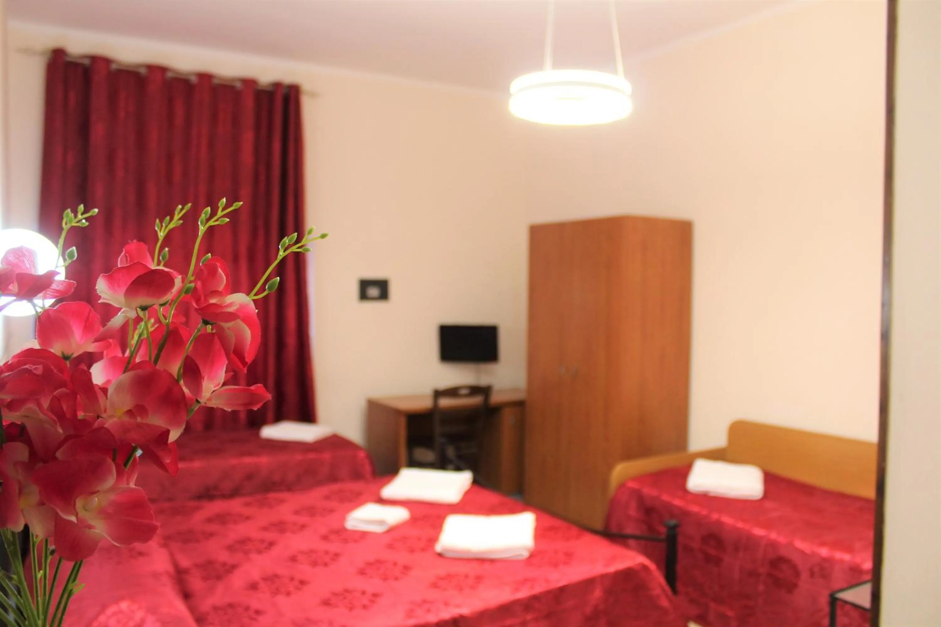 Bed in Hotel Eurorooms