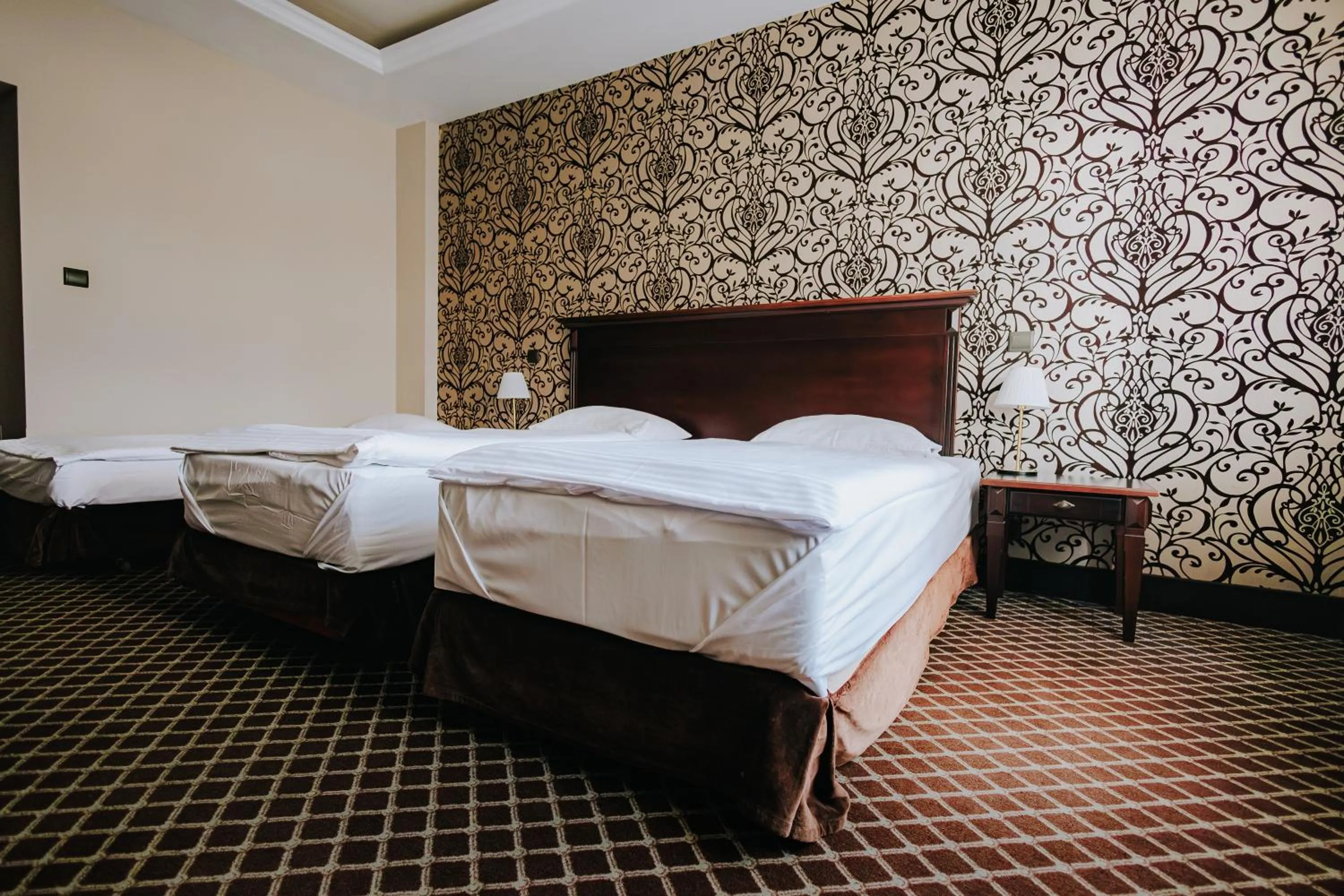 Bed in Hotel Wileński