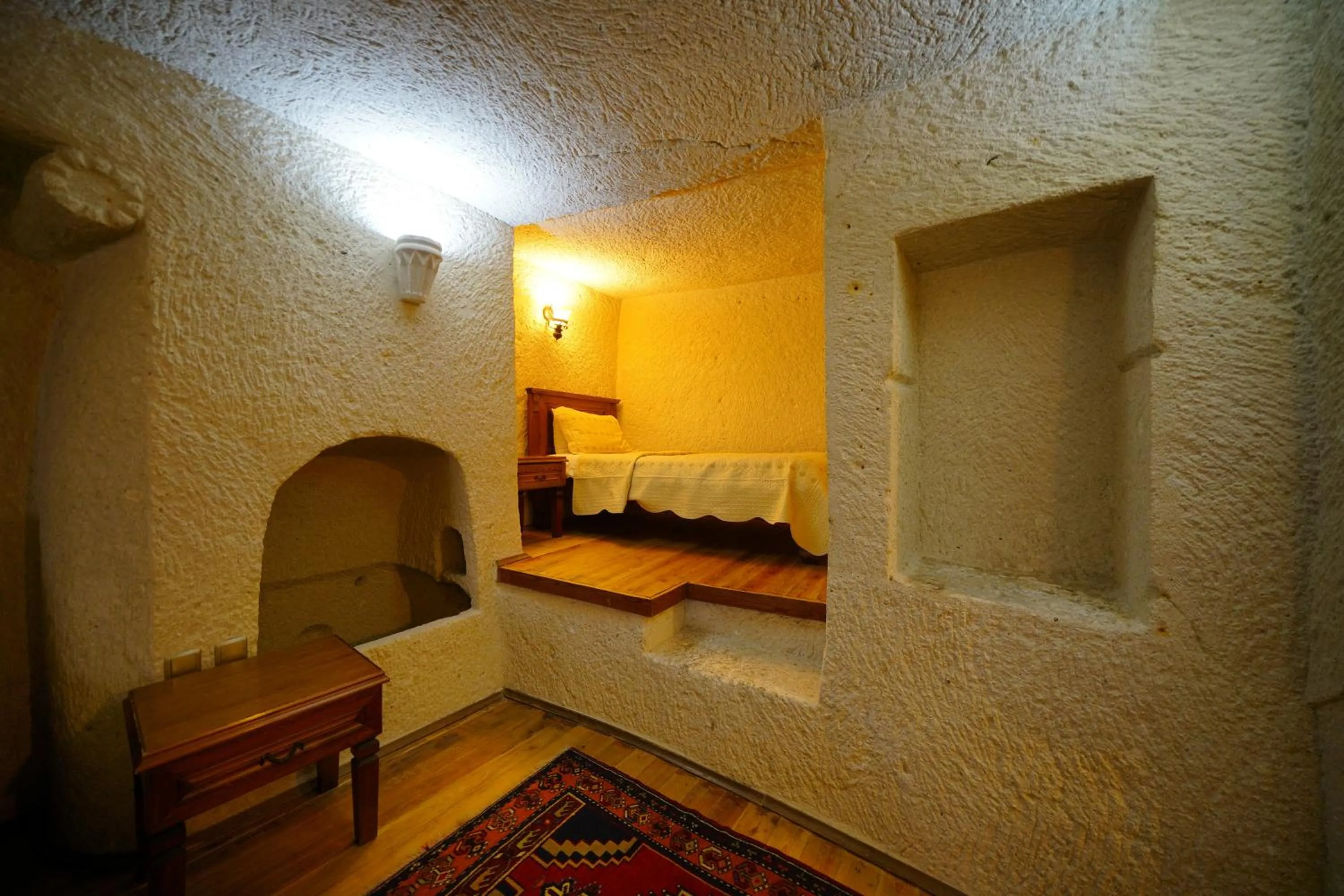 Bed in Vezir Cave Suites
