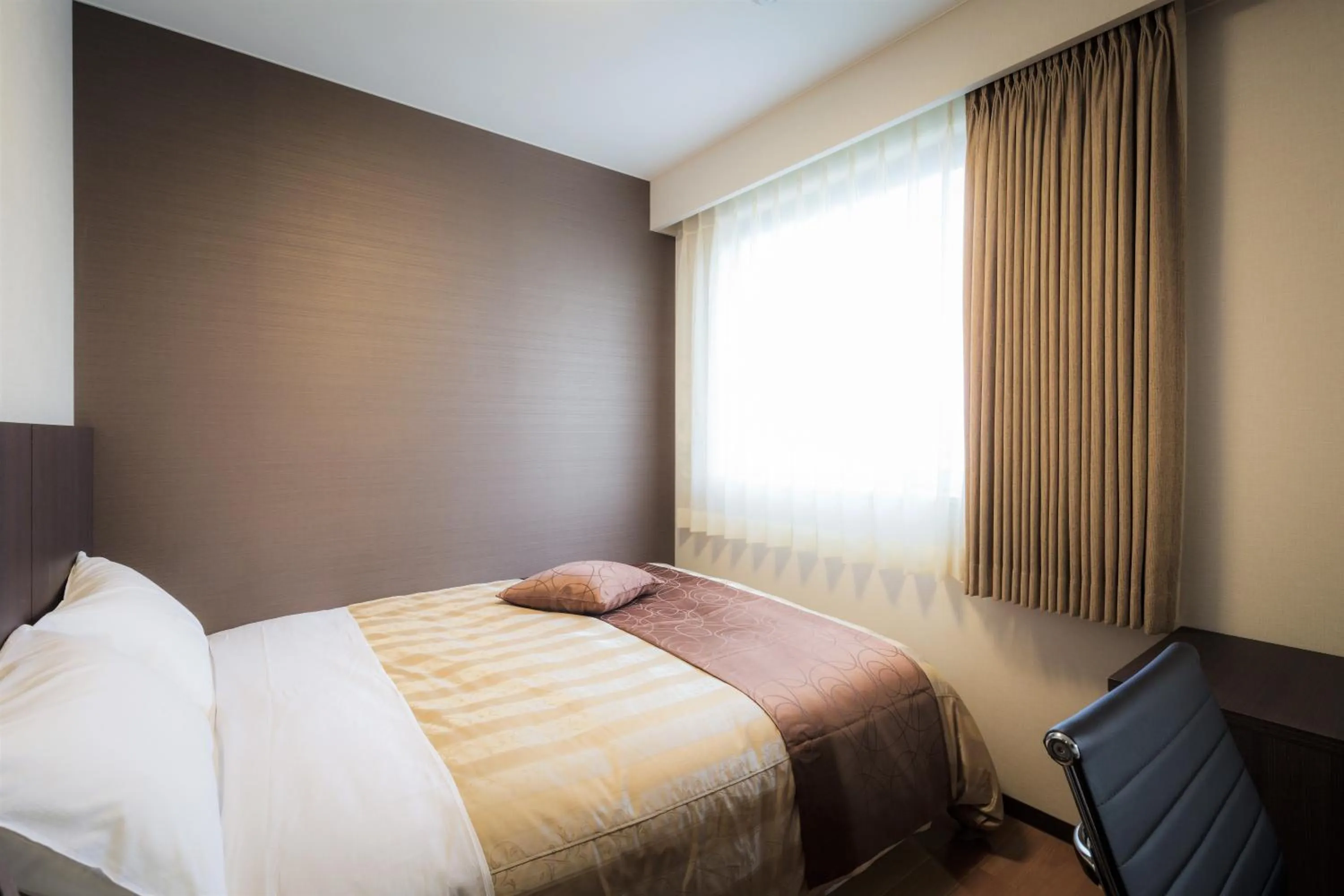 Photo of the whole room, Bed in Hotel Katsuyama Premiere