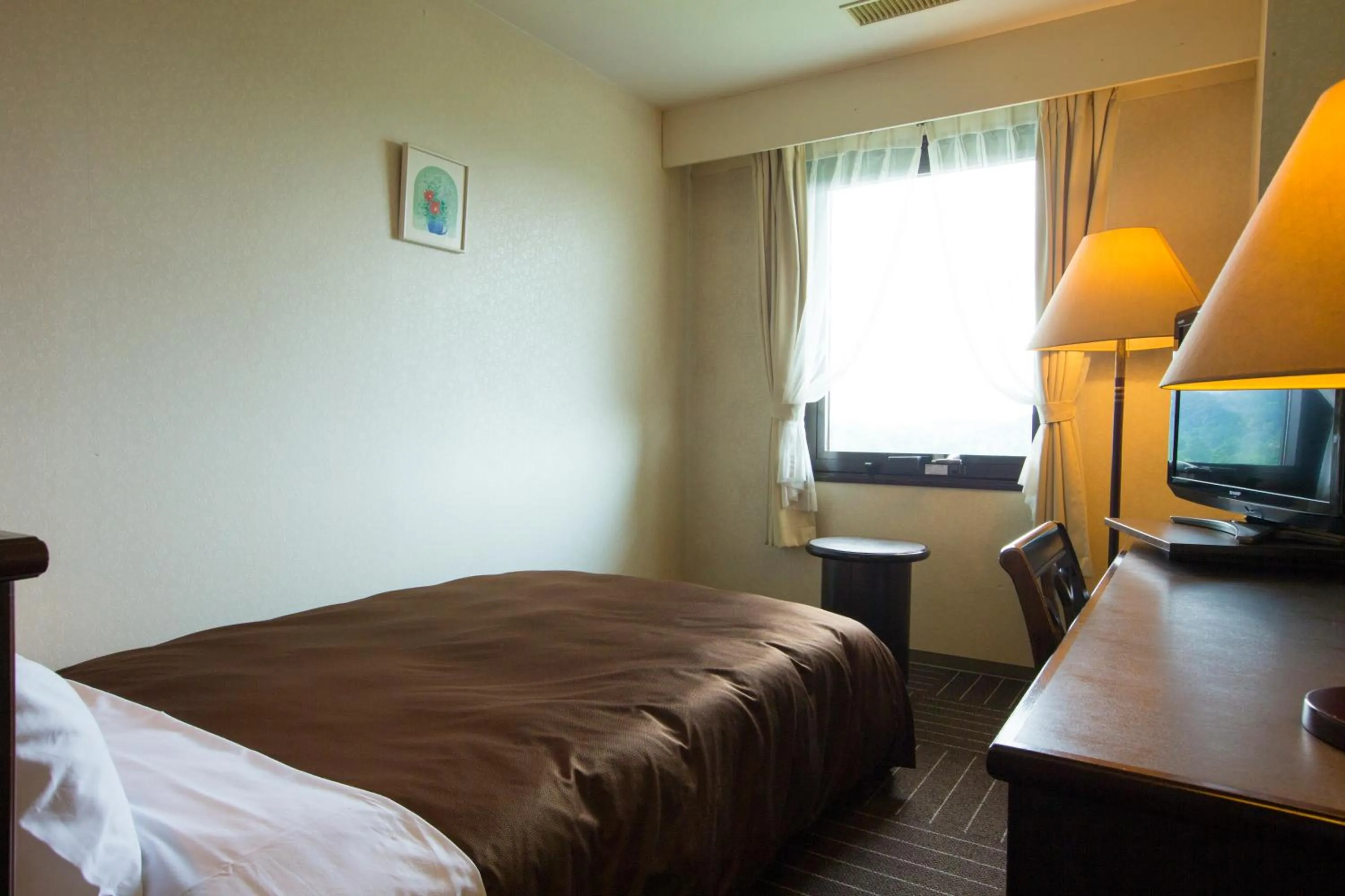 Bed in Hotel Green Hill Kagoshima