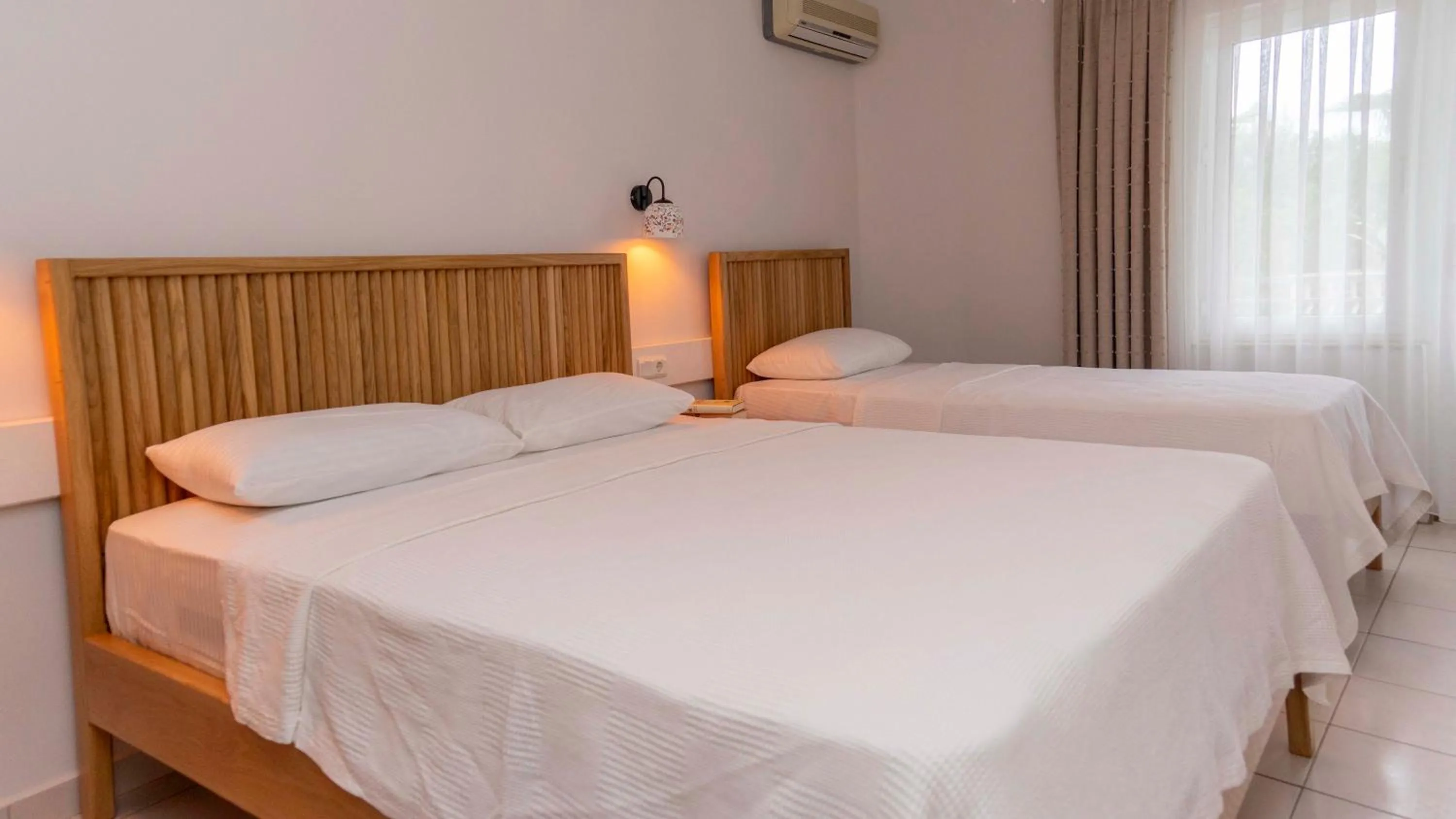 Bed in Golden Lighthouse Hotel