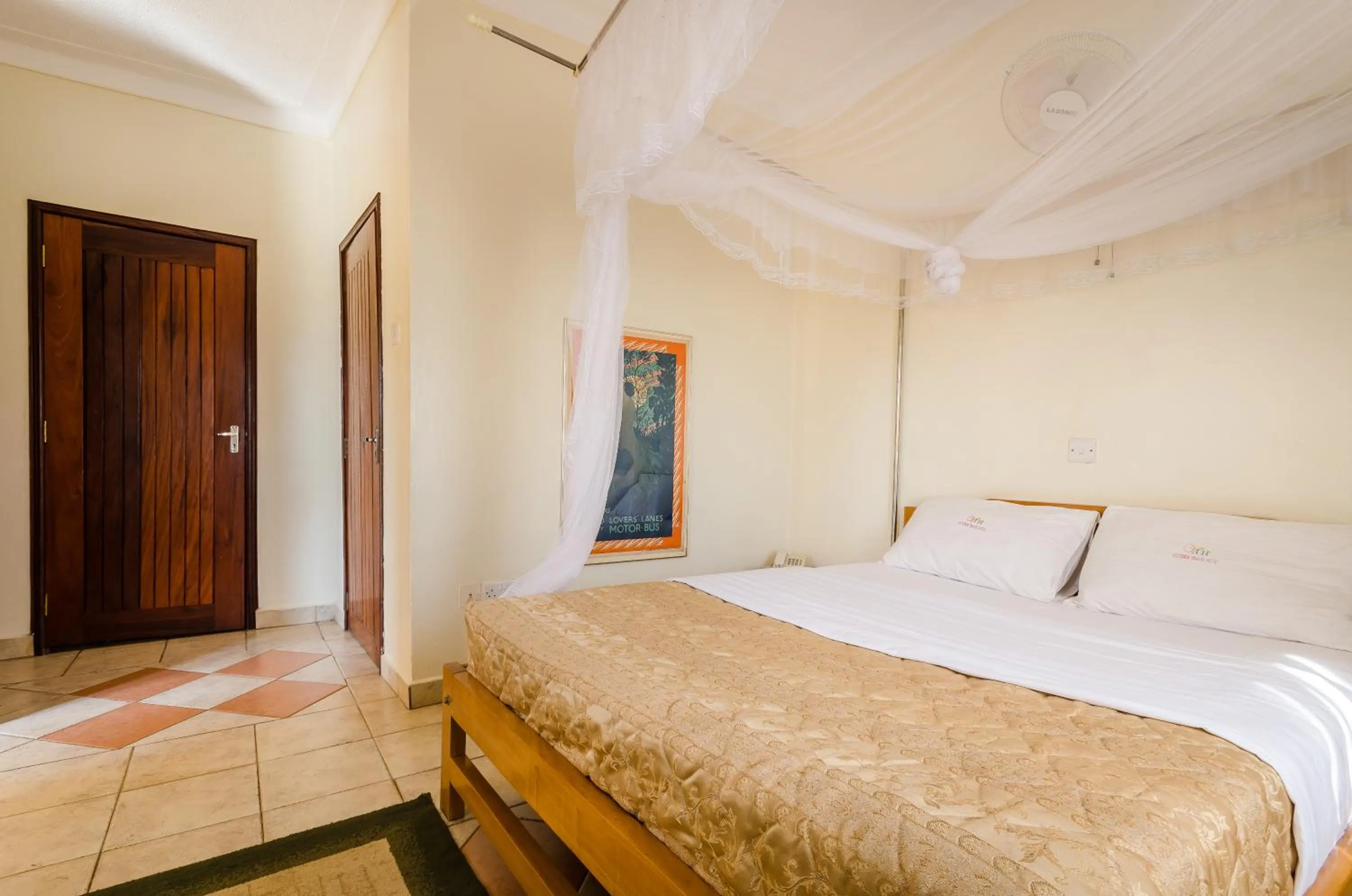 Bedroom in Victoria Travel Hotel