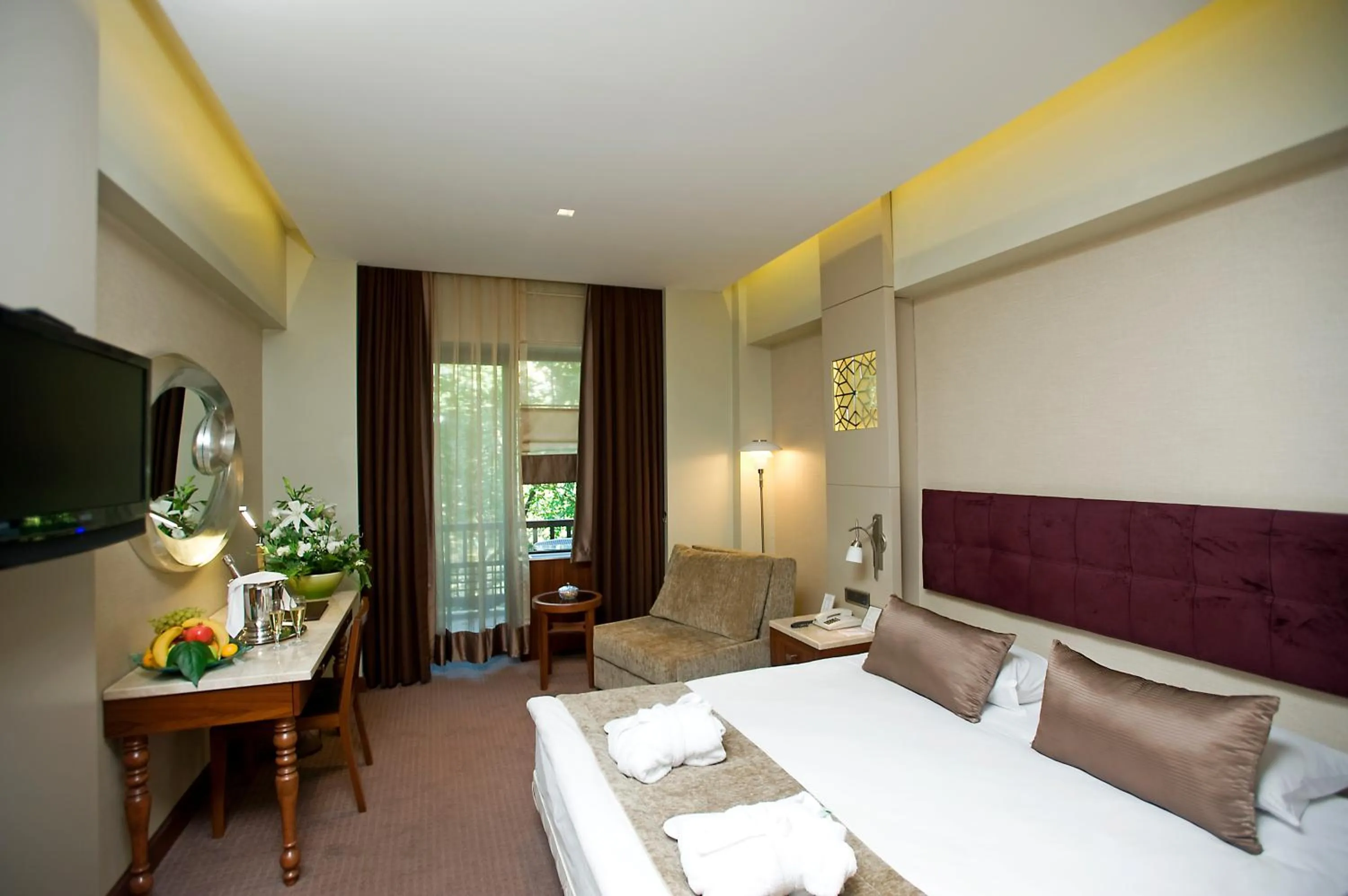 Bed in Kervansaray Thermal Convention Center & Spa