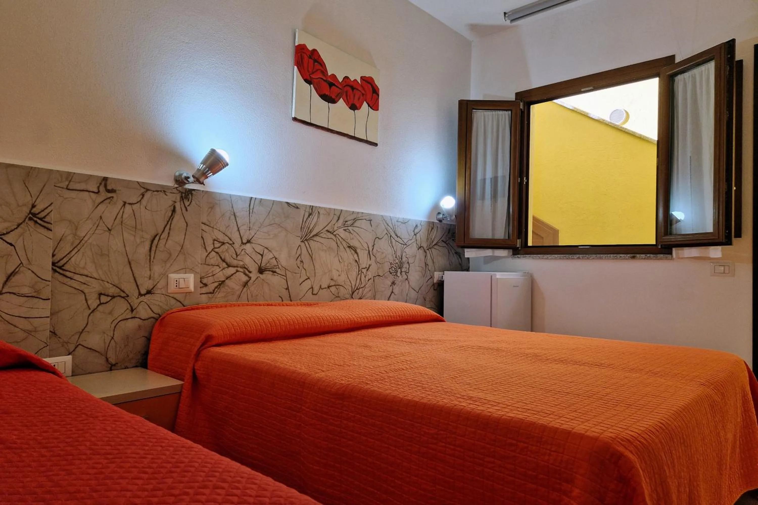 Bedroom in Sa Mamma e Sole B&B