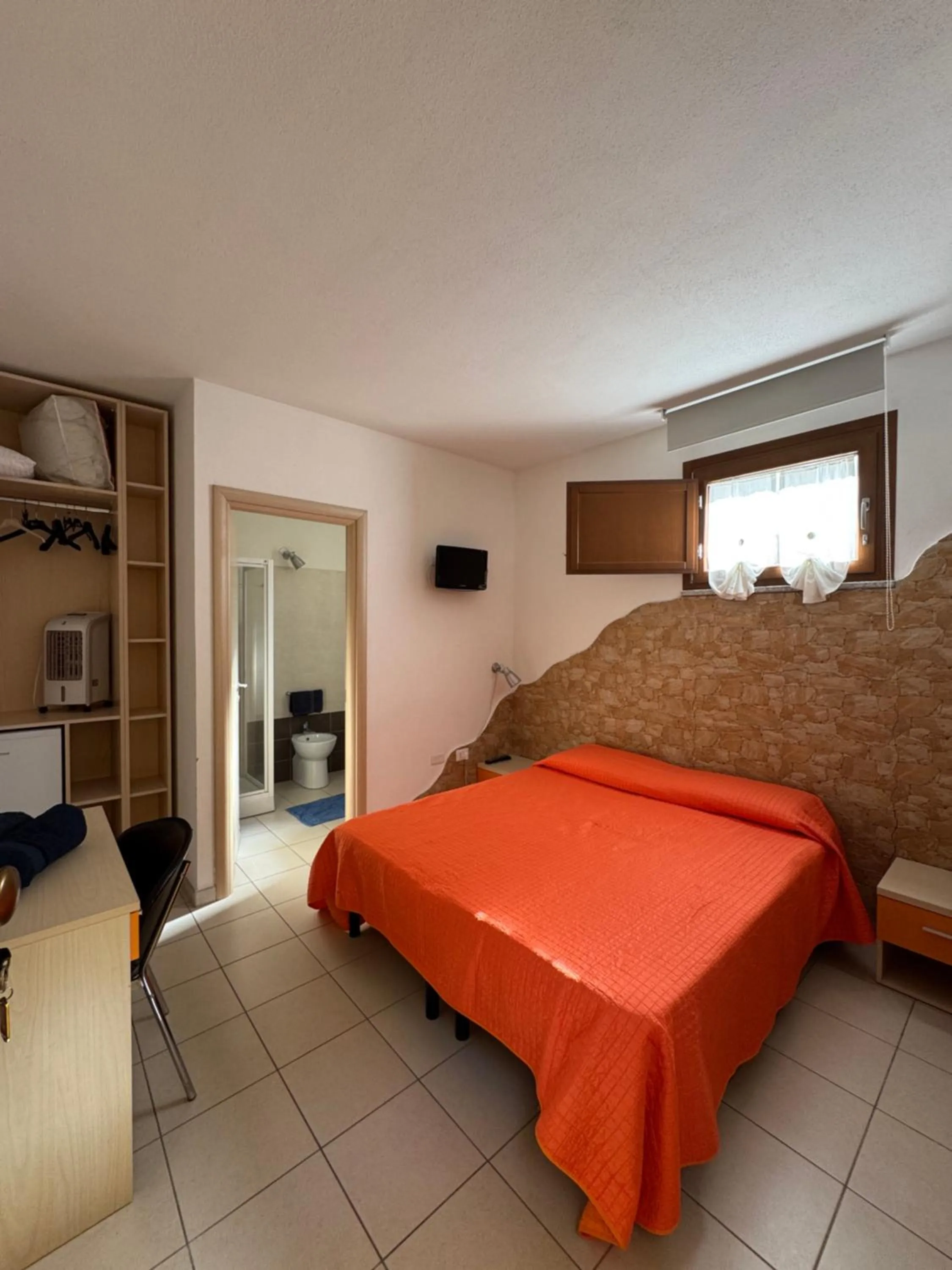 Bedroom in Sa Mamma e Sole B&B