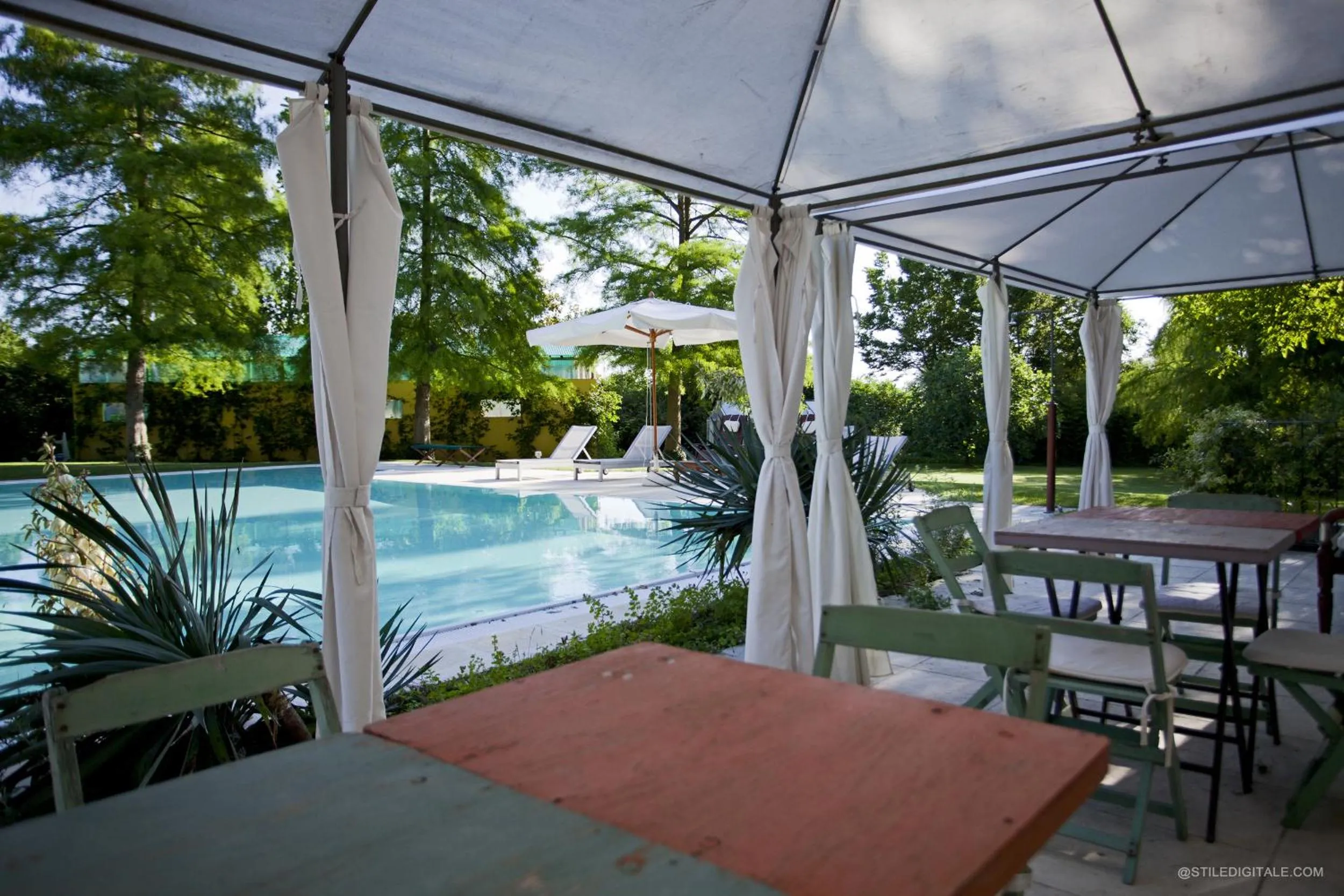 Pool view in Pragatto Hills by Casino di Pragatto