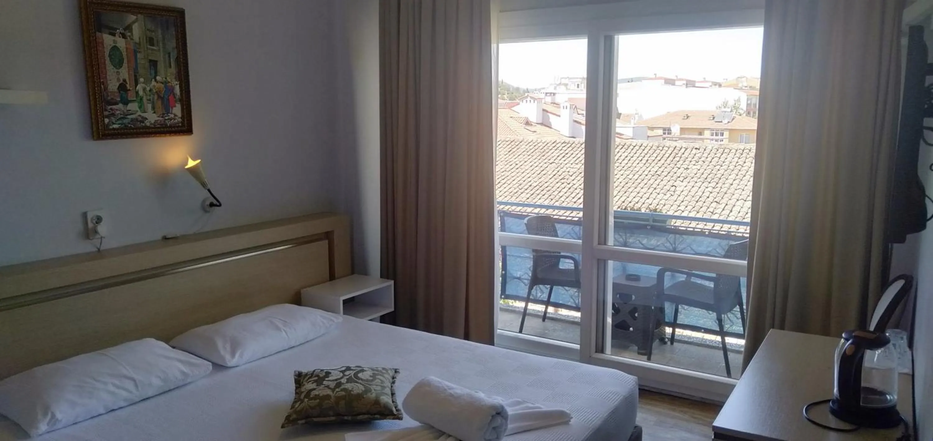 Photo of the whole room, Bed in Urkmez Hotel