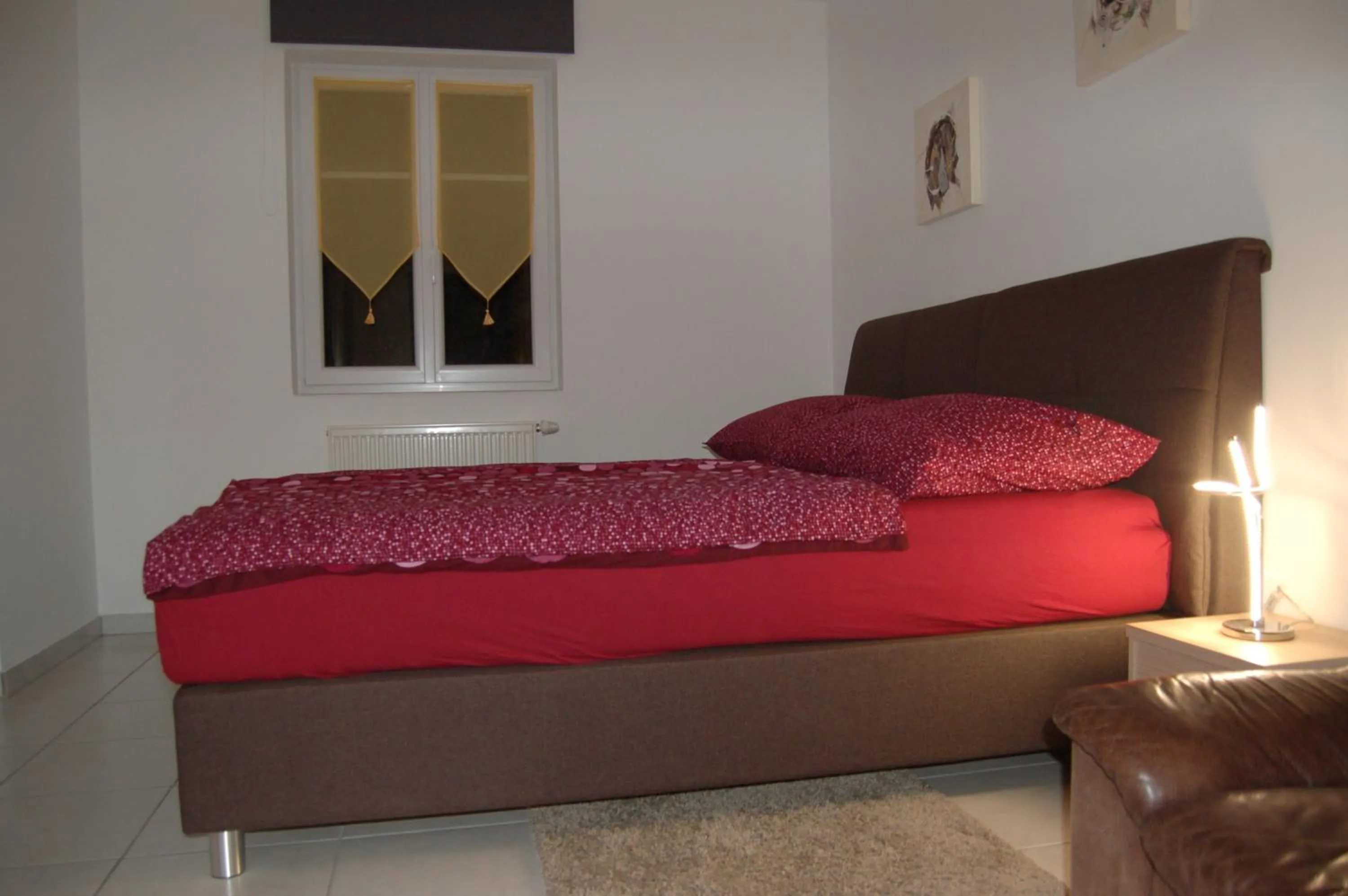 Bed in Ferienwohnung Frate