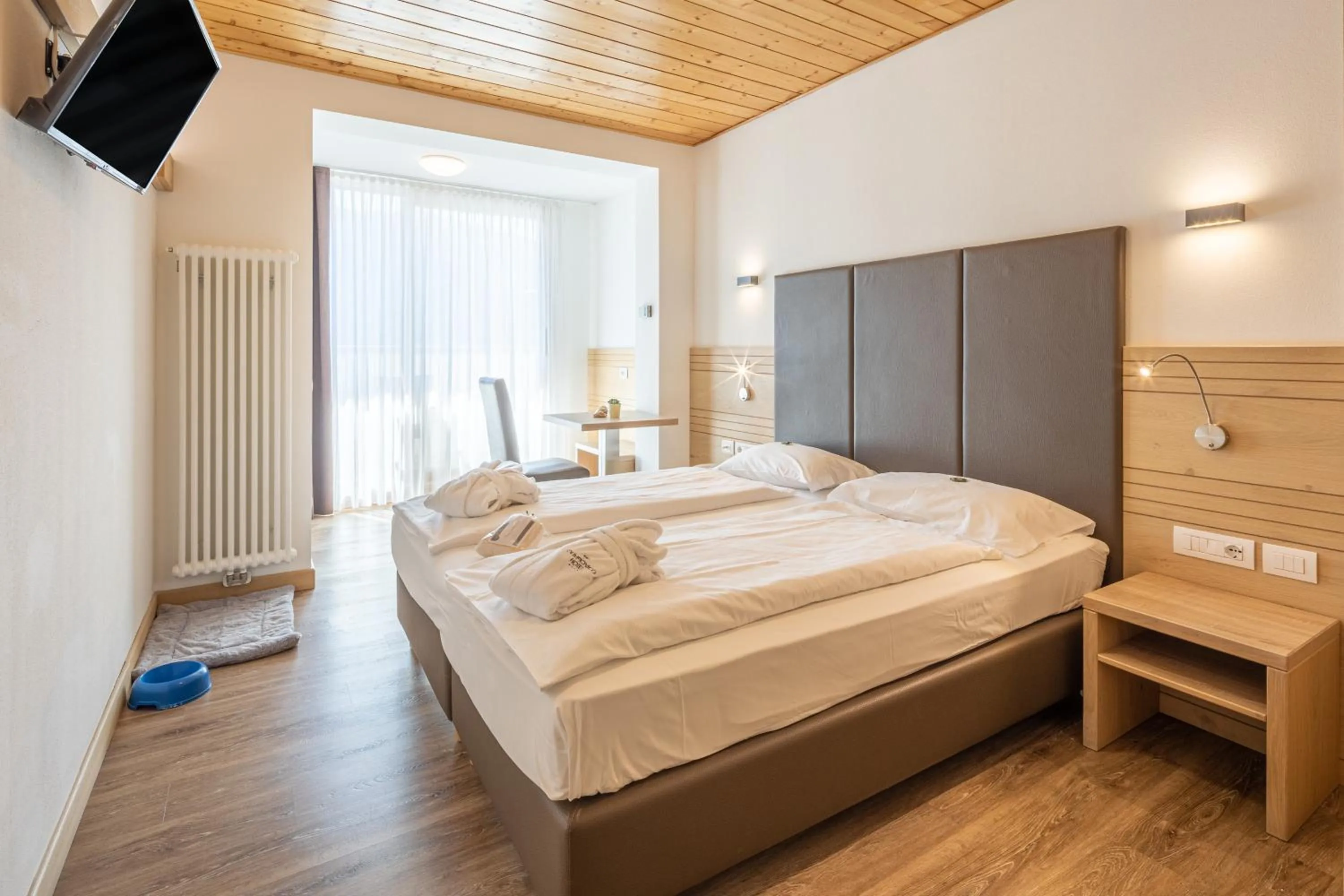 Bed in Olimpionico Hotel