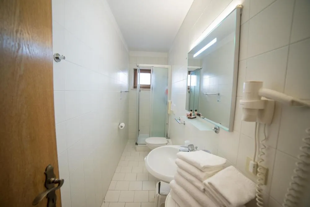 Bathroom in Olimpionico Hotel