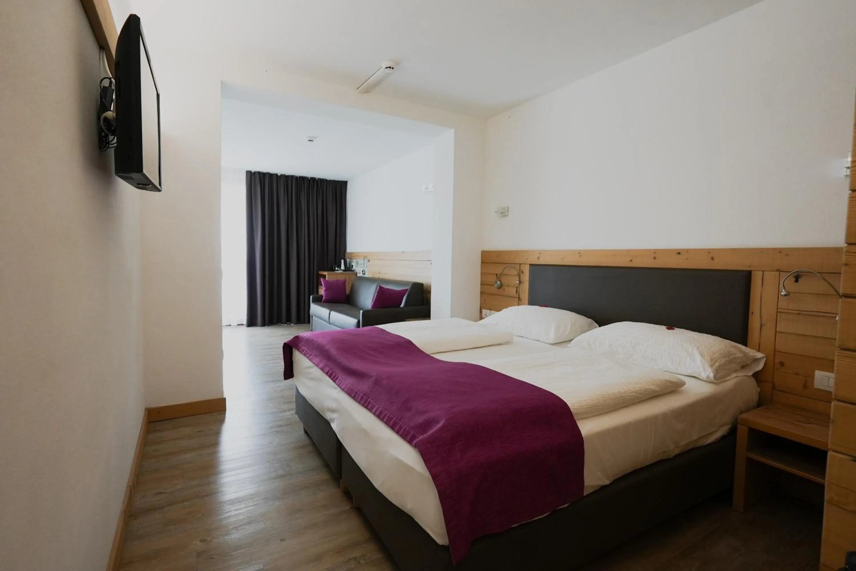 Bed in Olimpionico Hotel