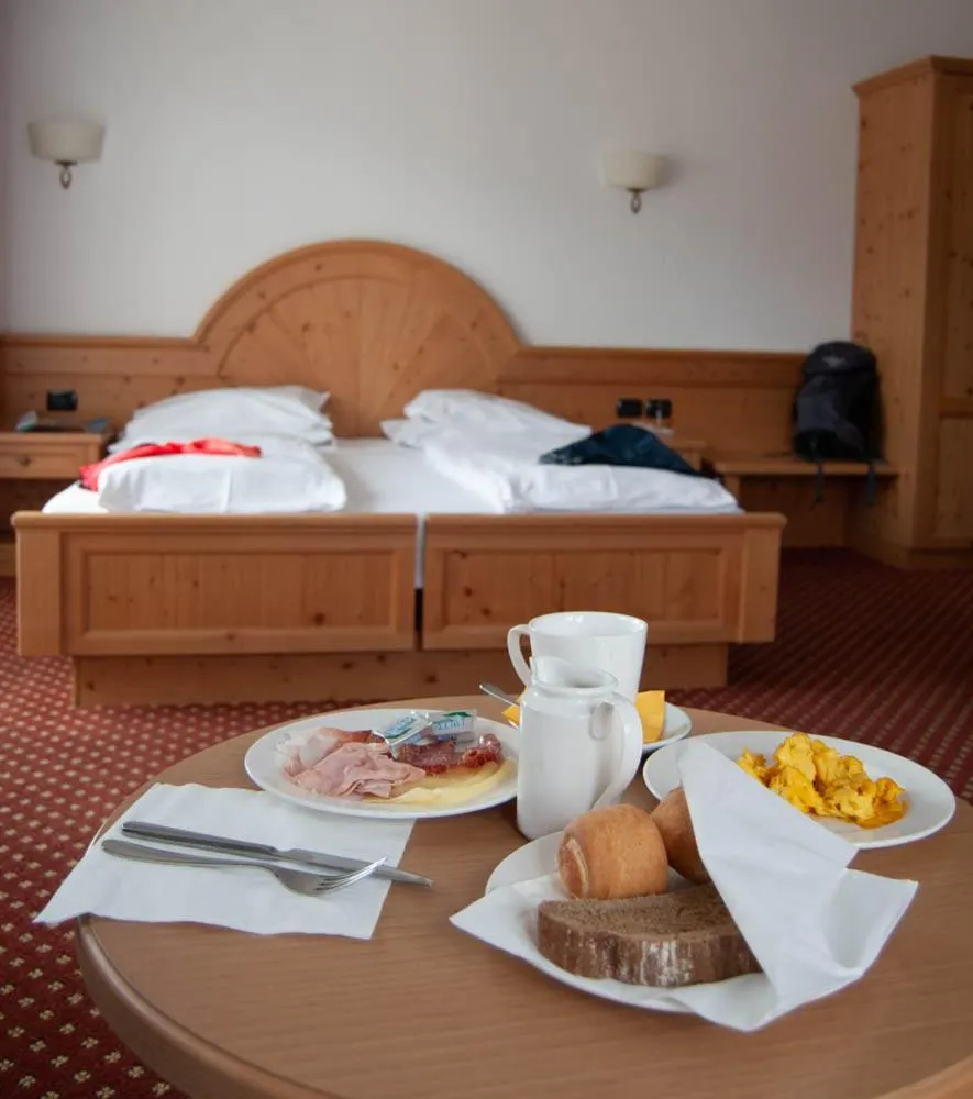 Deluxe Quadruple Room in Olimpionico Hotel