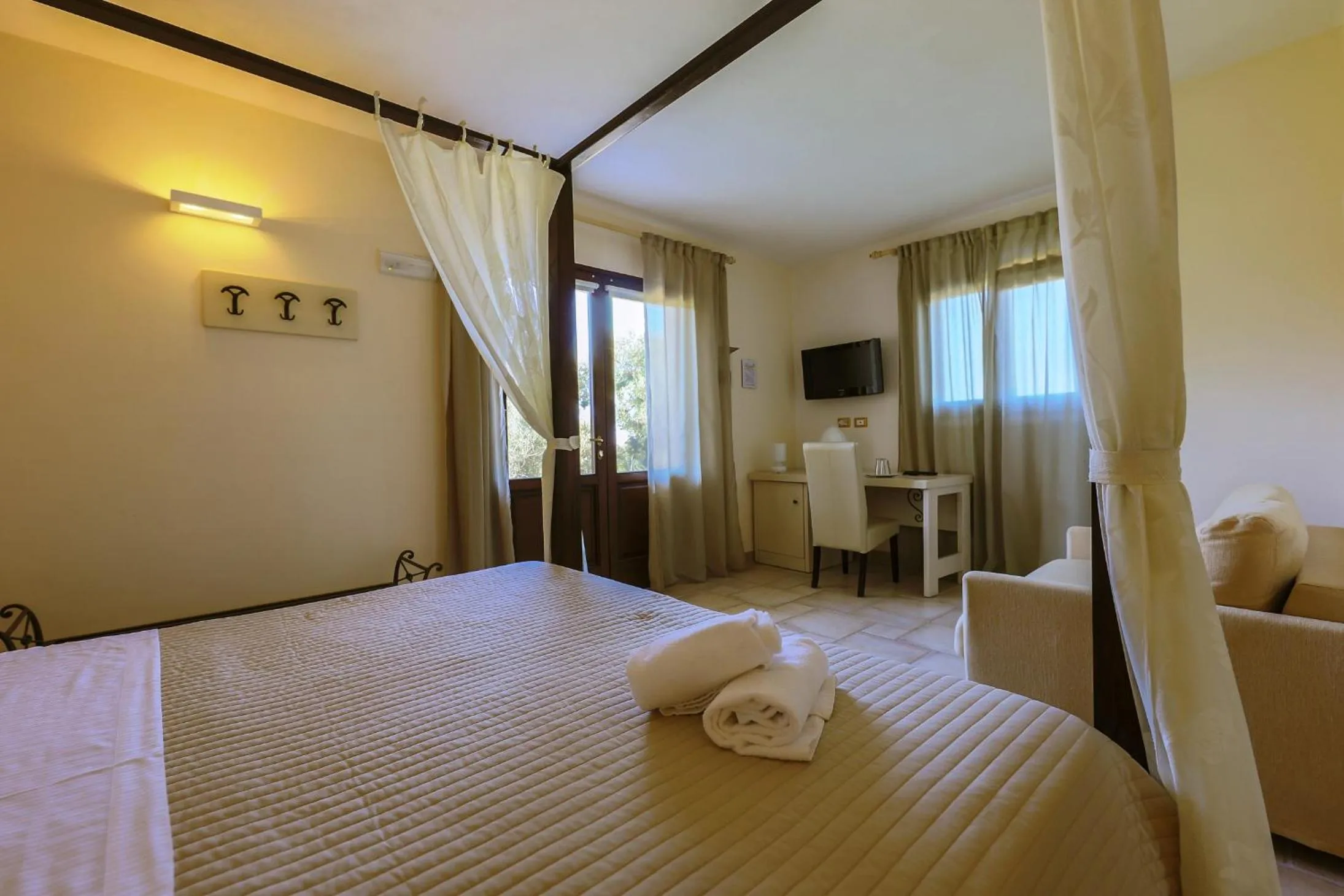 Bed in Corte Di Ferro Hotel & Wellness Resort
