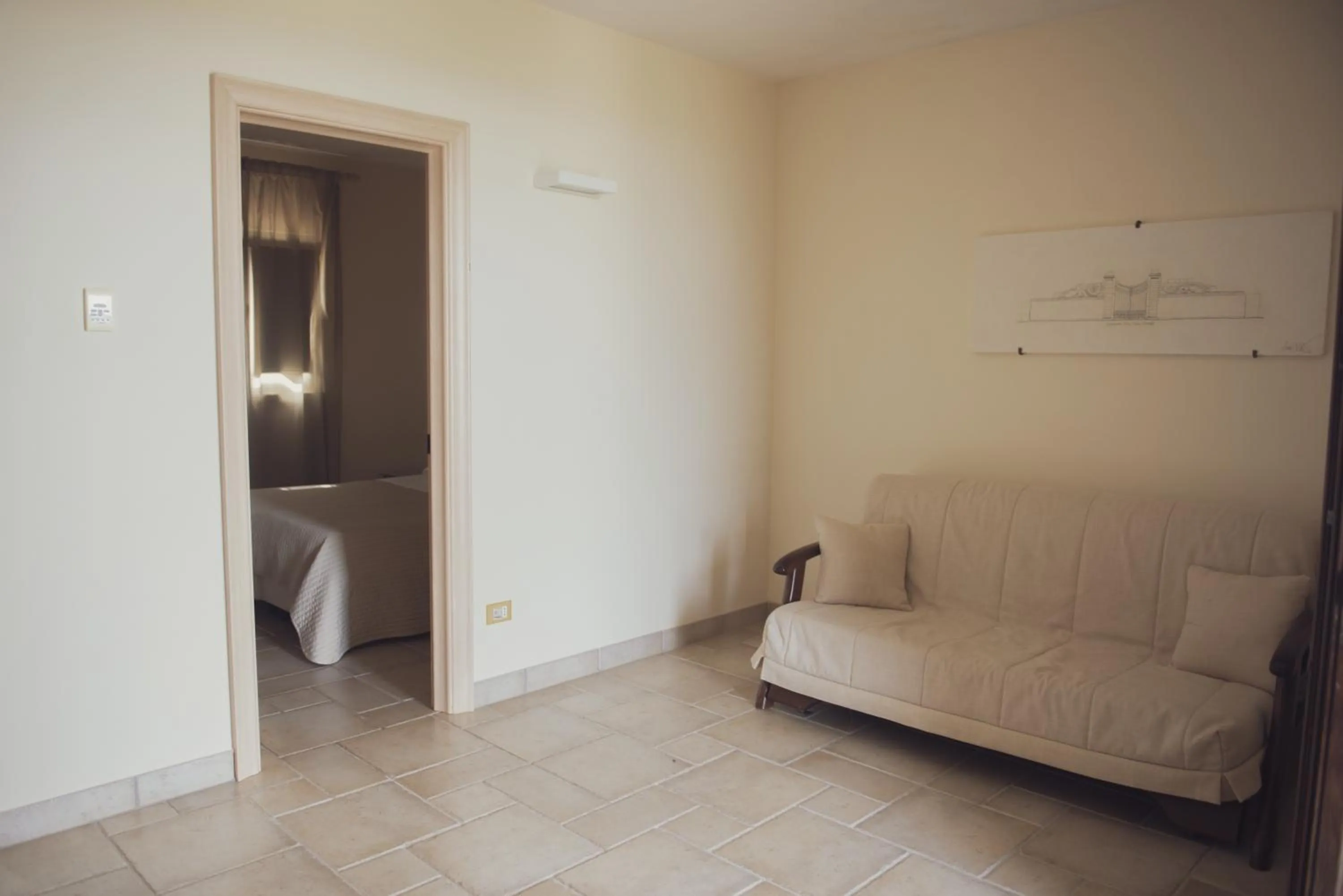 Living room, Bed in Corte Di Ferro Hotel & Wellness Resort