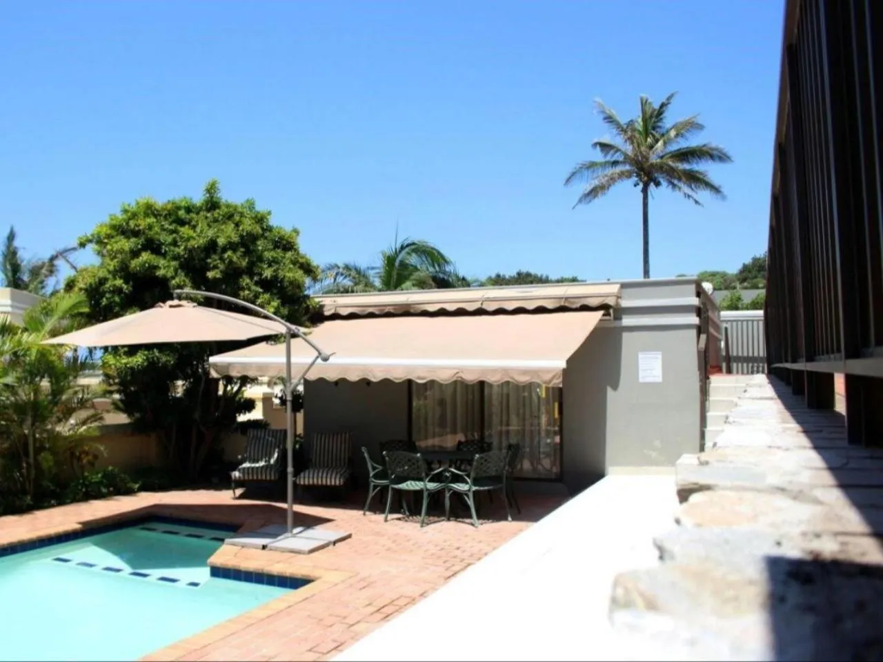 Pool view in At Doms B&B