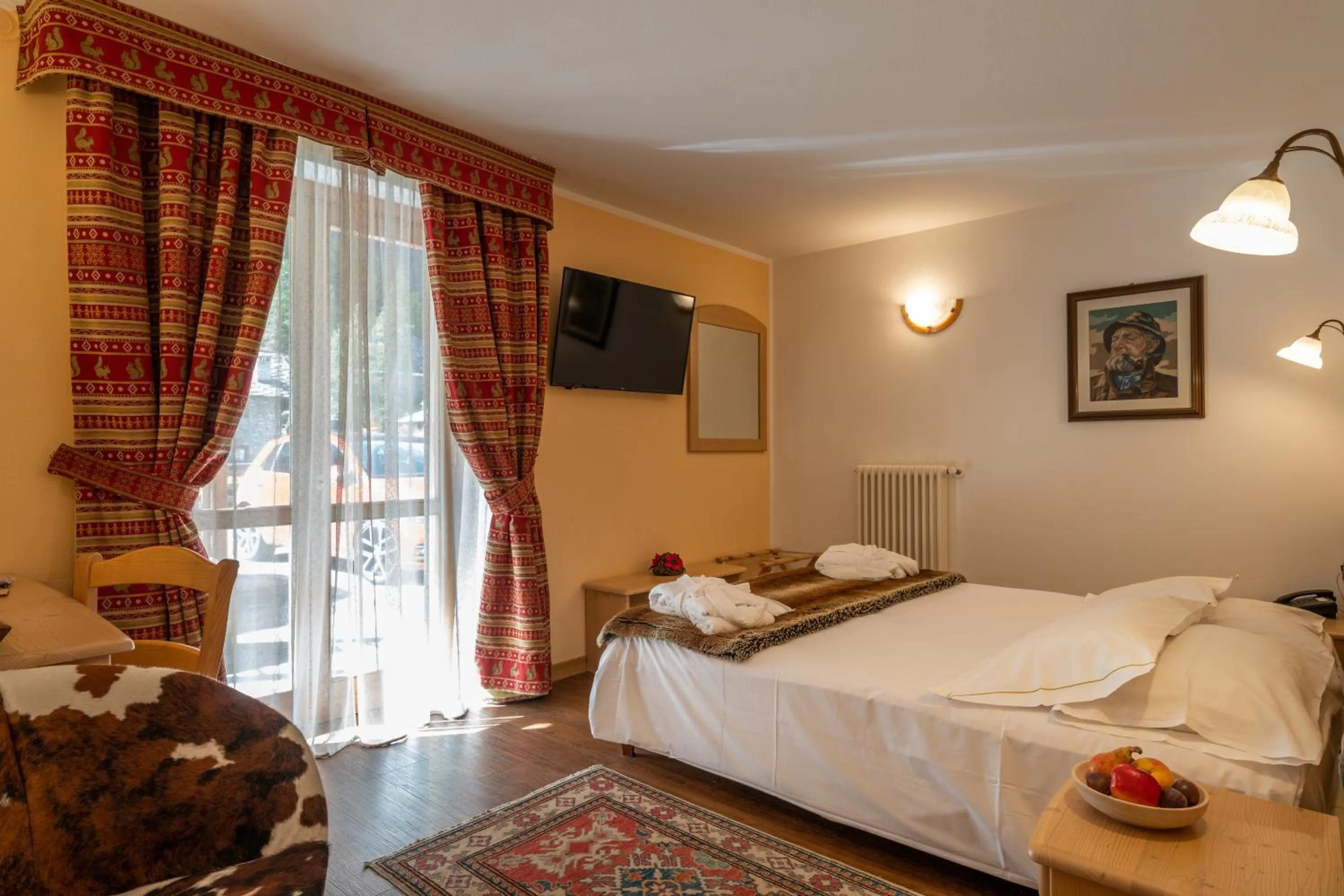 Bed in Lo Scoiattolo Hotel