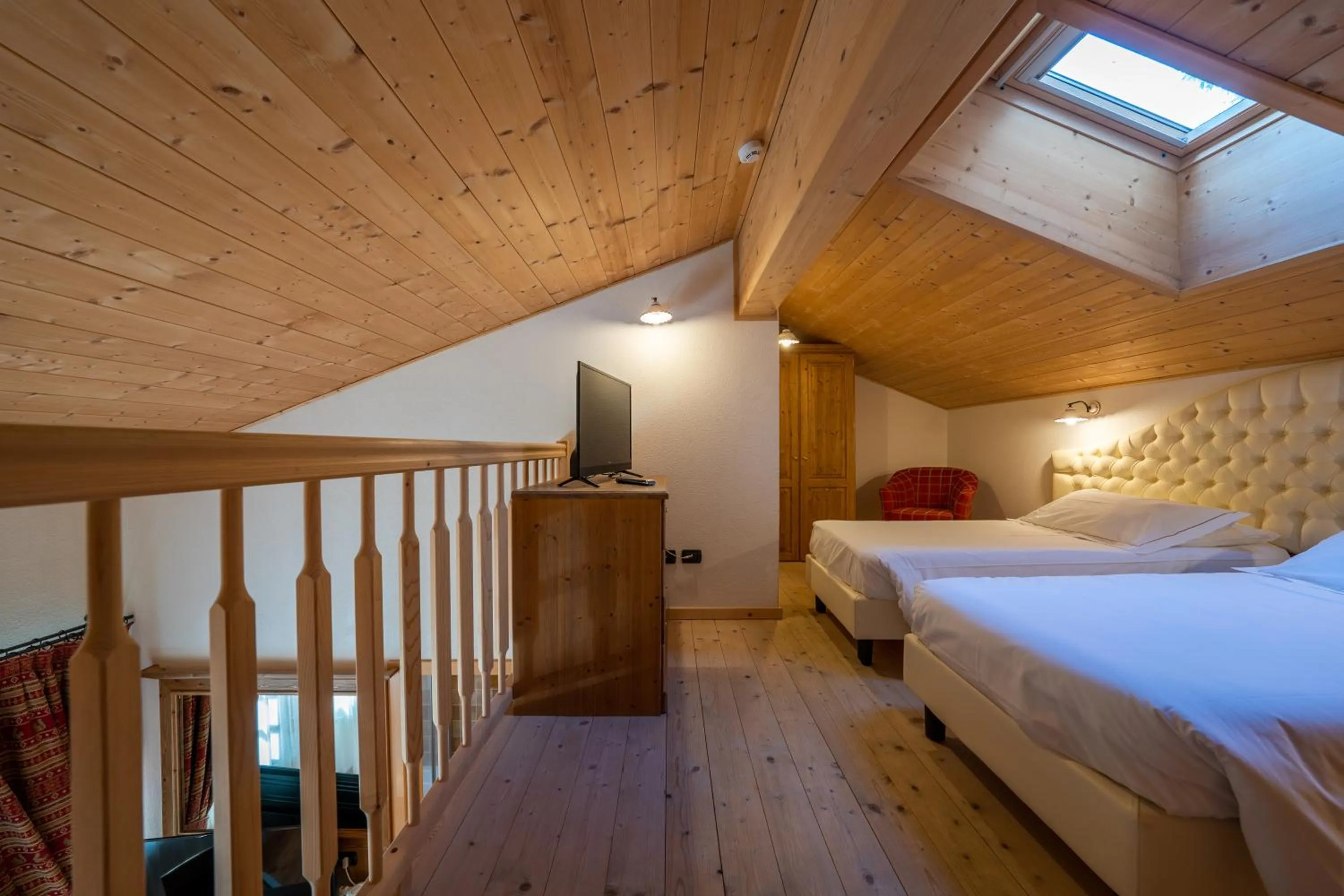 Bed in Lo Scoiattolo Hotel