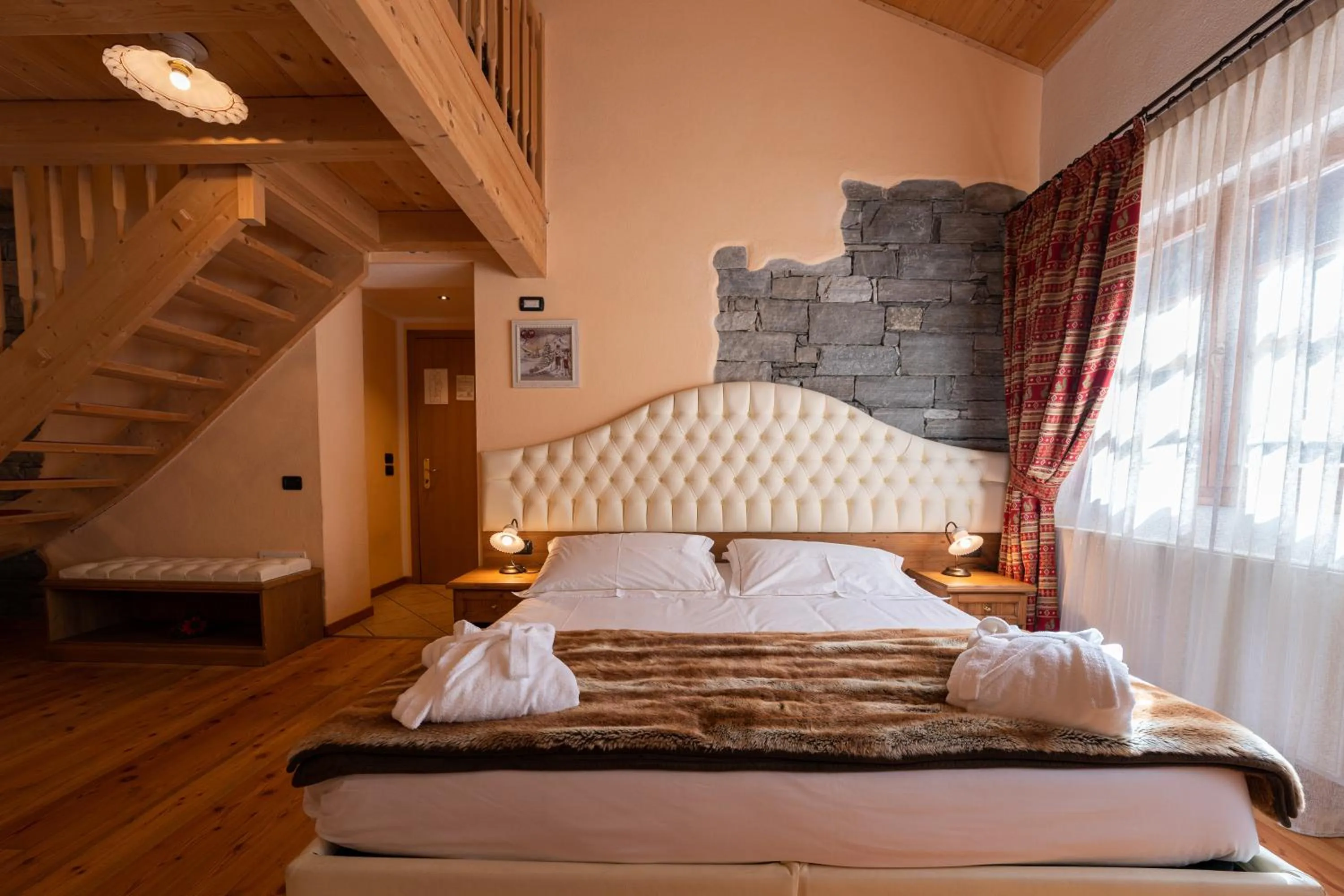 Bed in Lo Scoiattolo Hotel