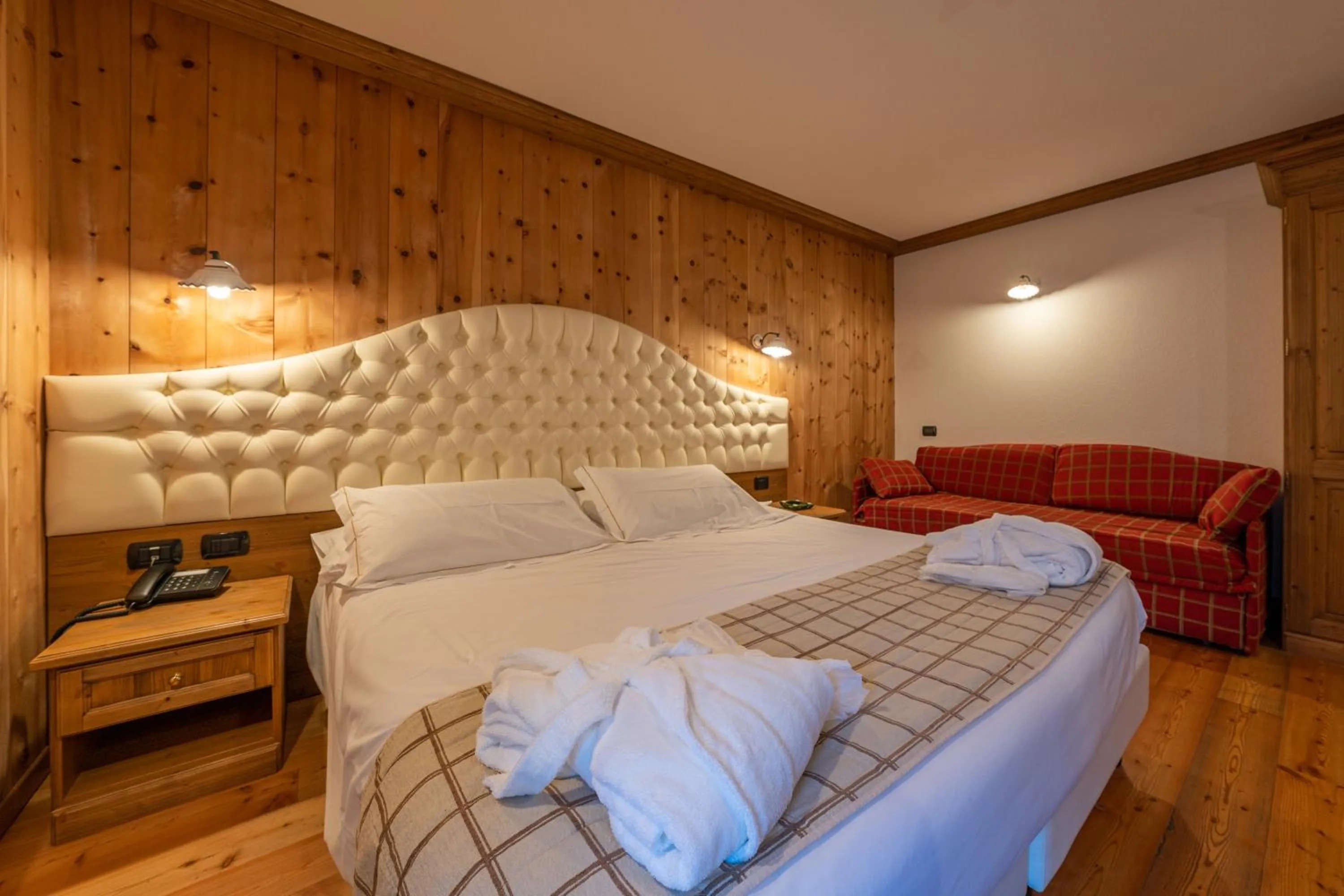 Bed in Lo Scoiattolo Hotel