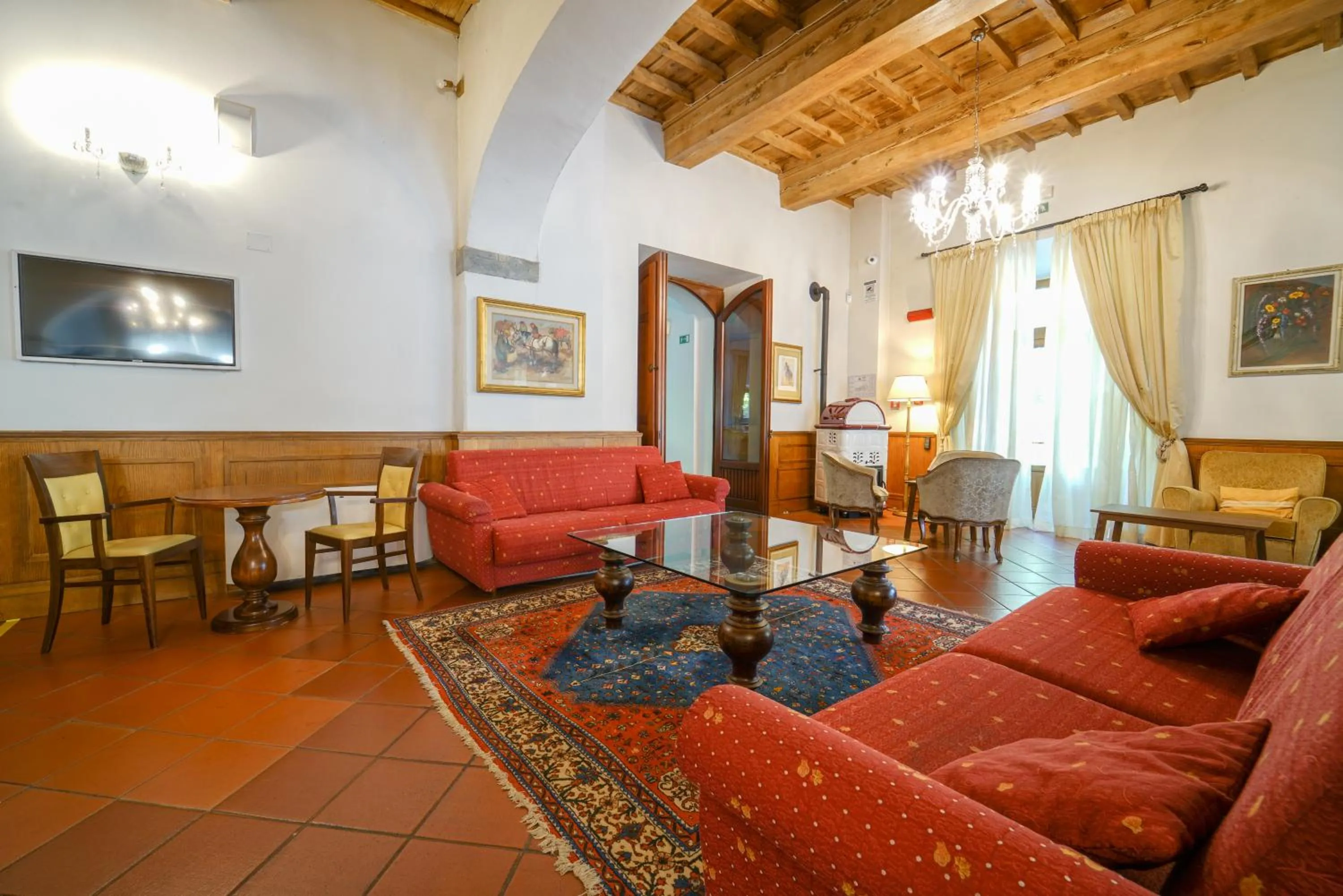 Communal lounge/ TV room in HG Abetone e Piramidi Resort