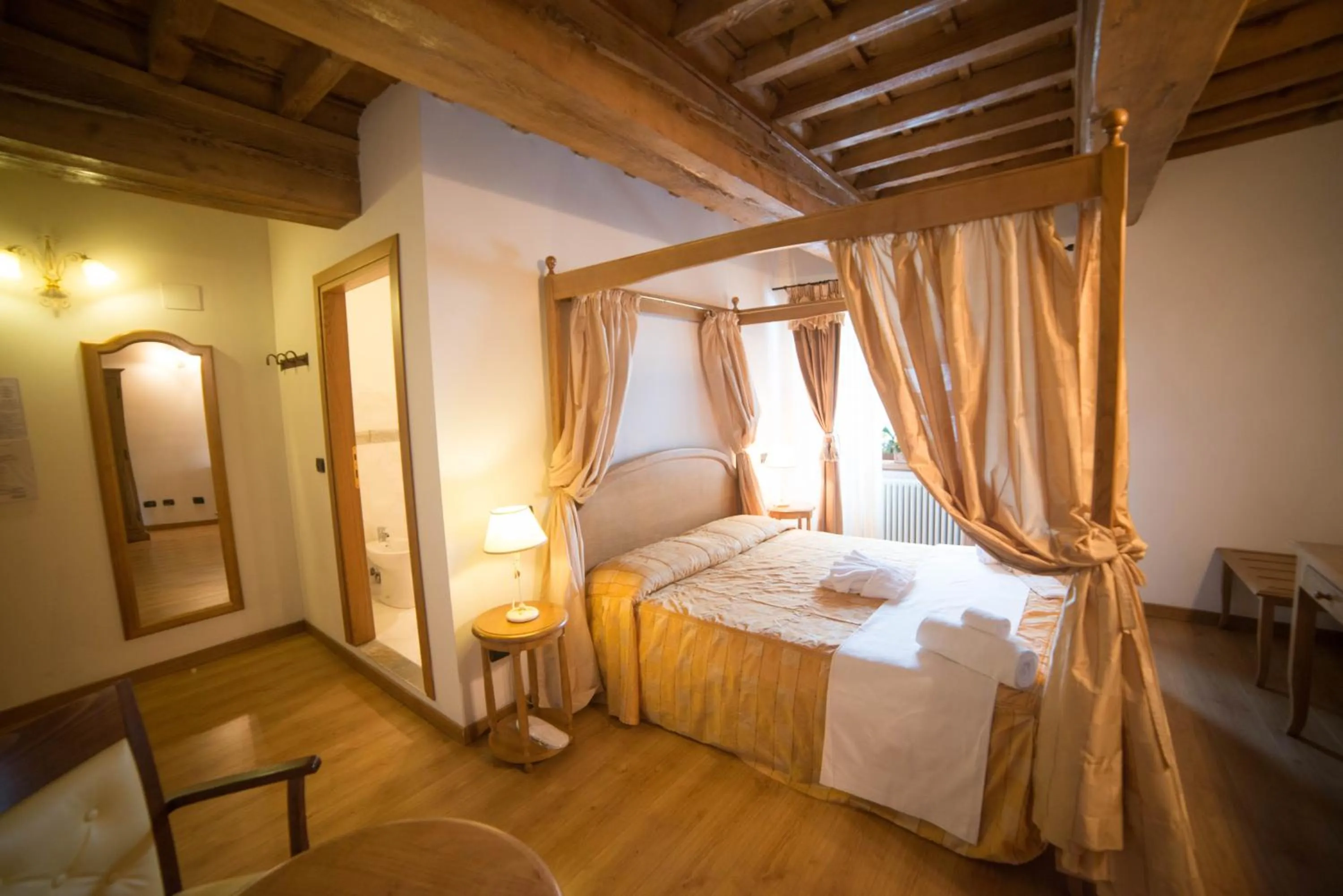 Photo of the whole room, Bed in HG Abetone e Piramidi Resort