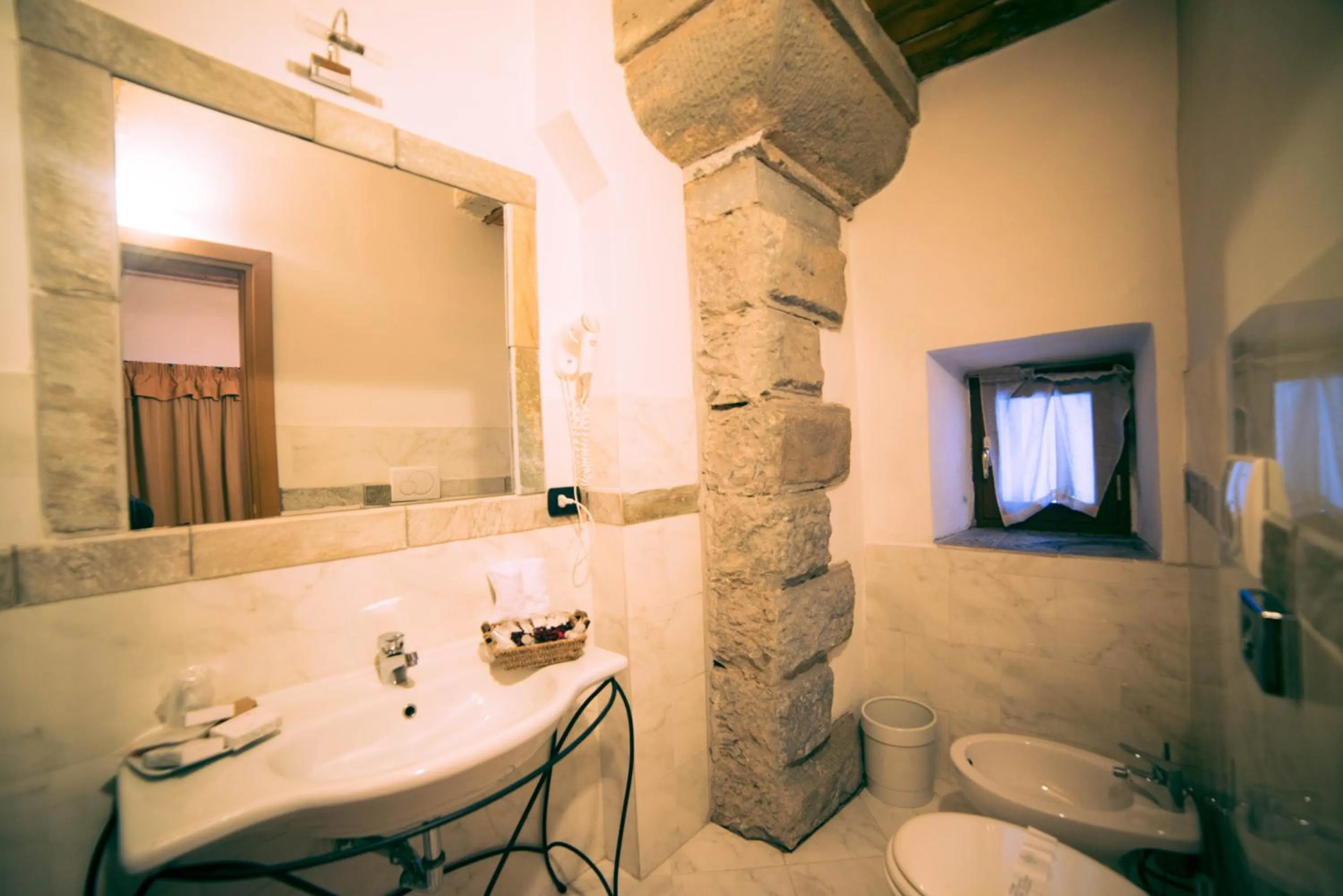 Bathroom in HG Abetone e Piramidi Resort