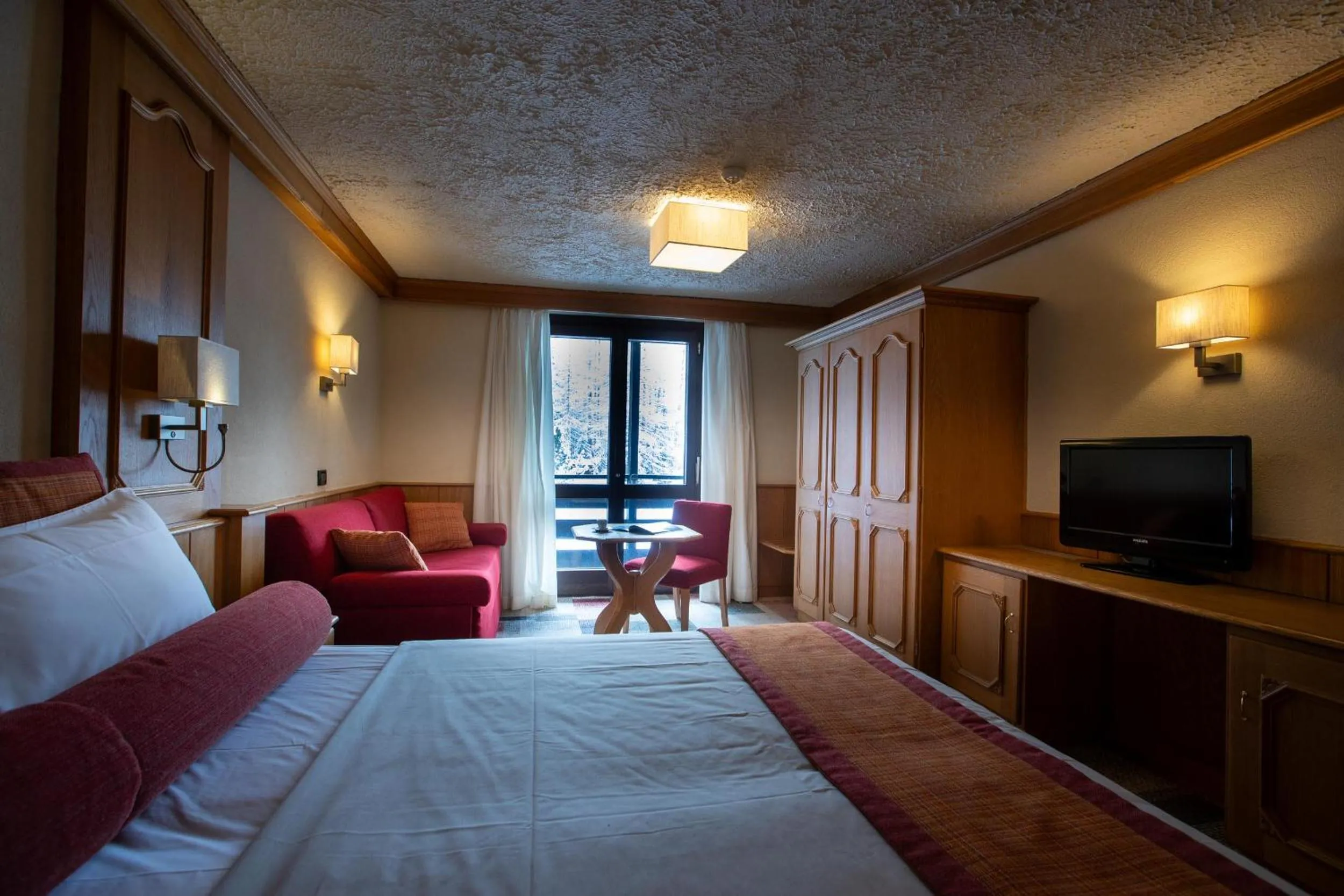 Bed in Hotel Intermonti