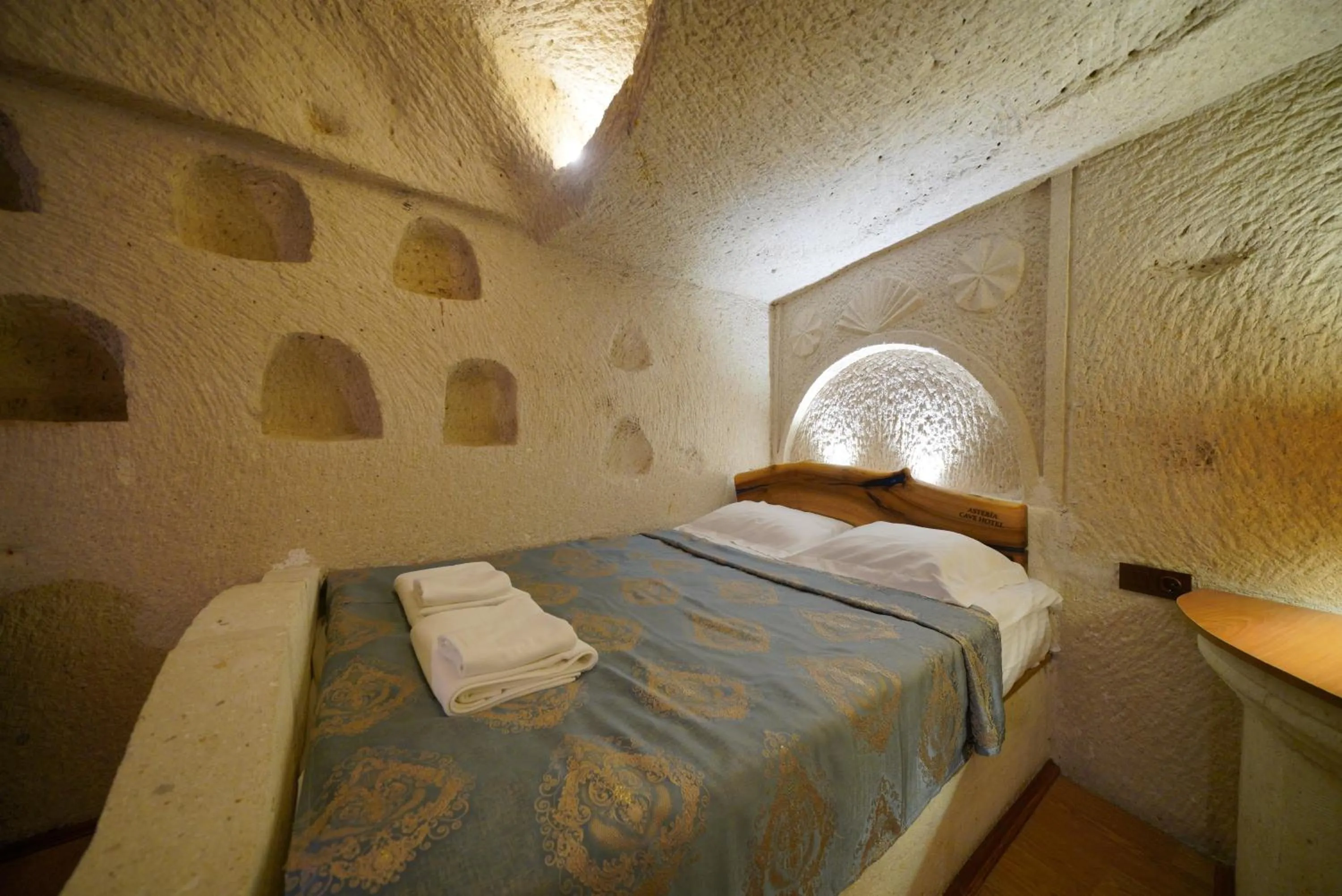 Bed in Asteria Cave Hotel