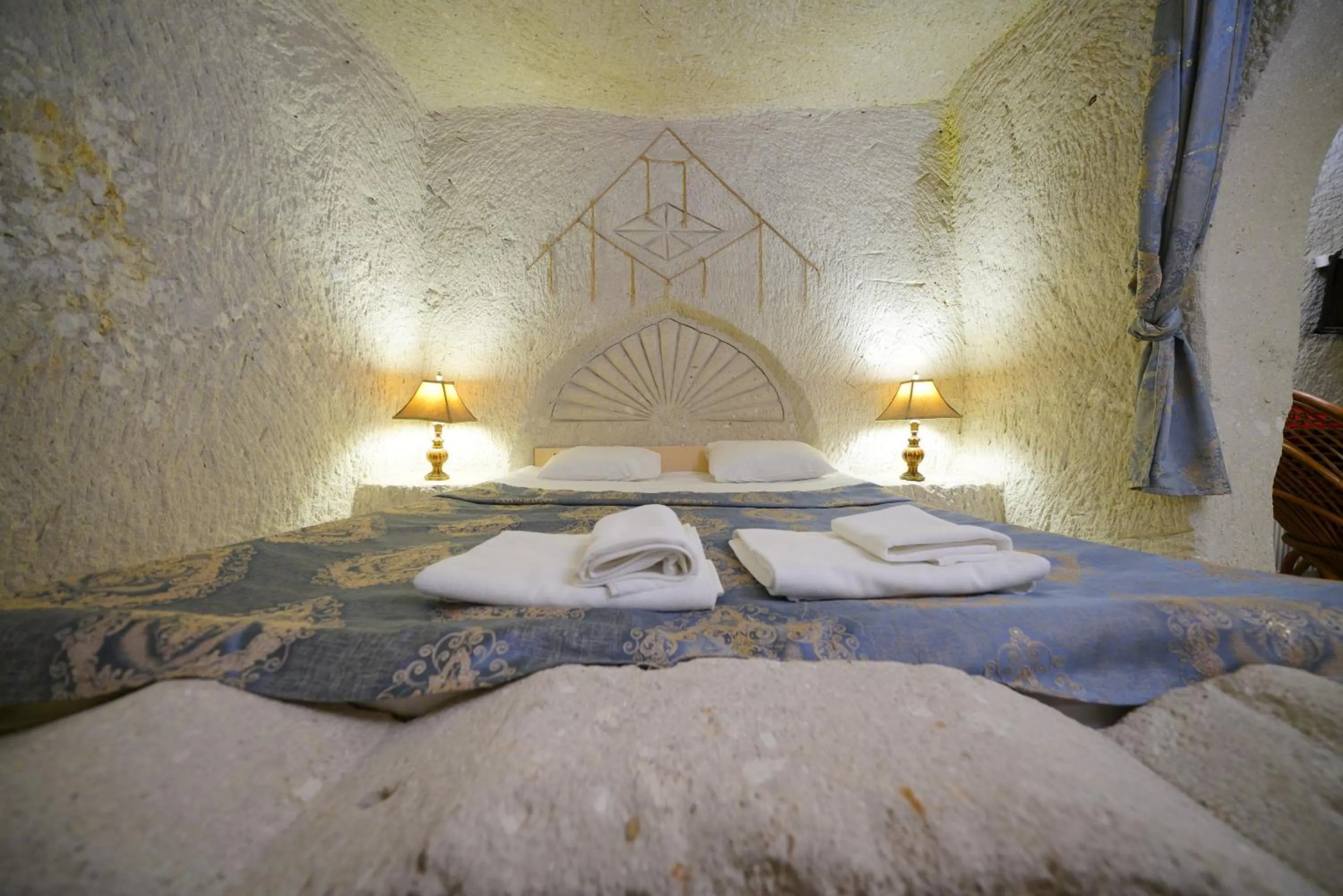 Bed in Asteria Cave Hotel
