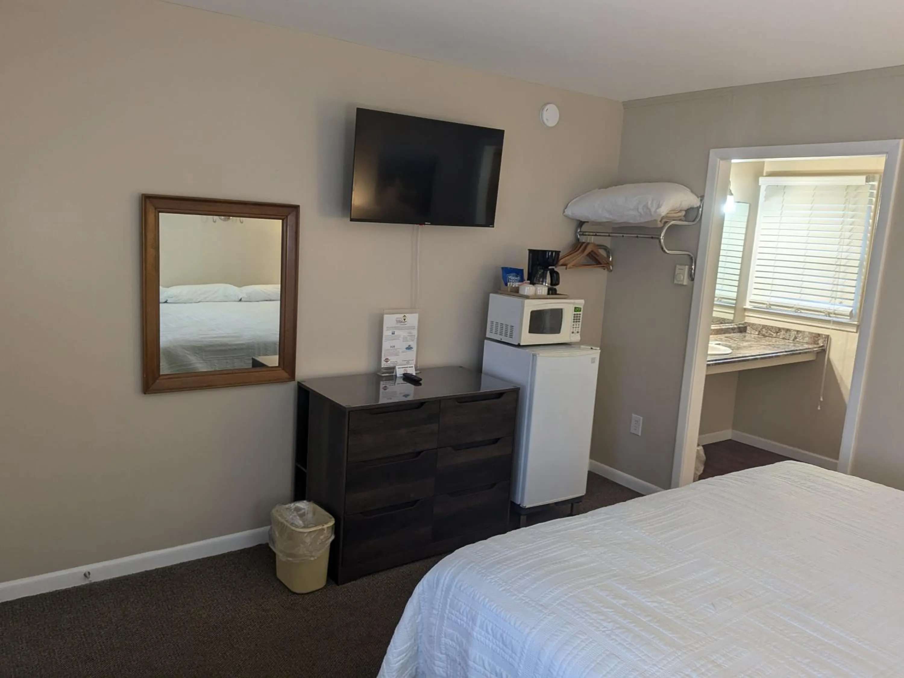 Bed in Early American Motel