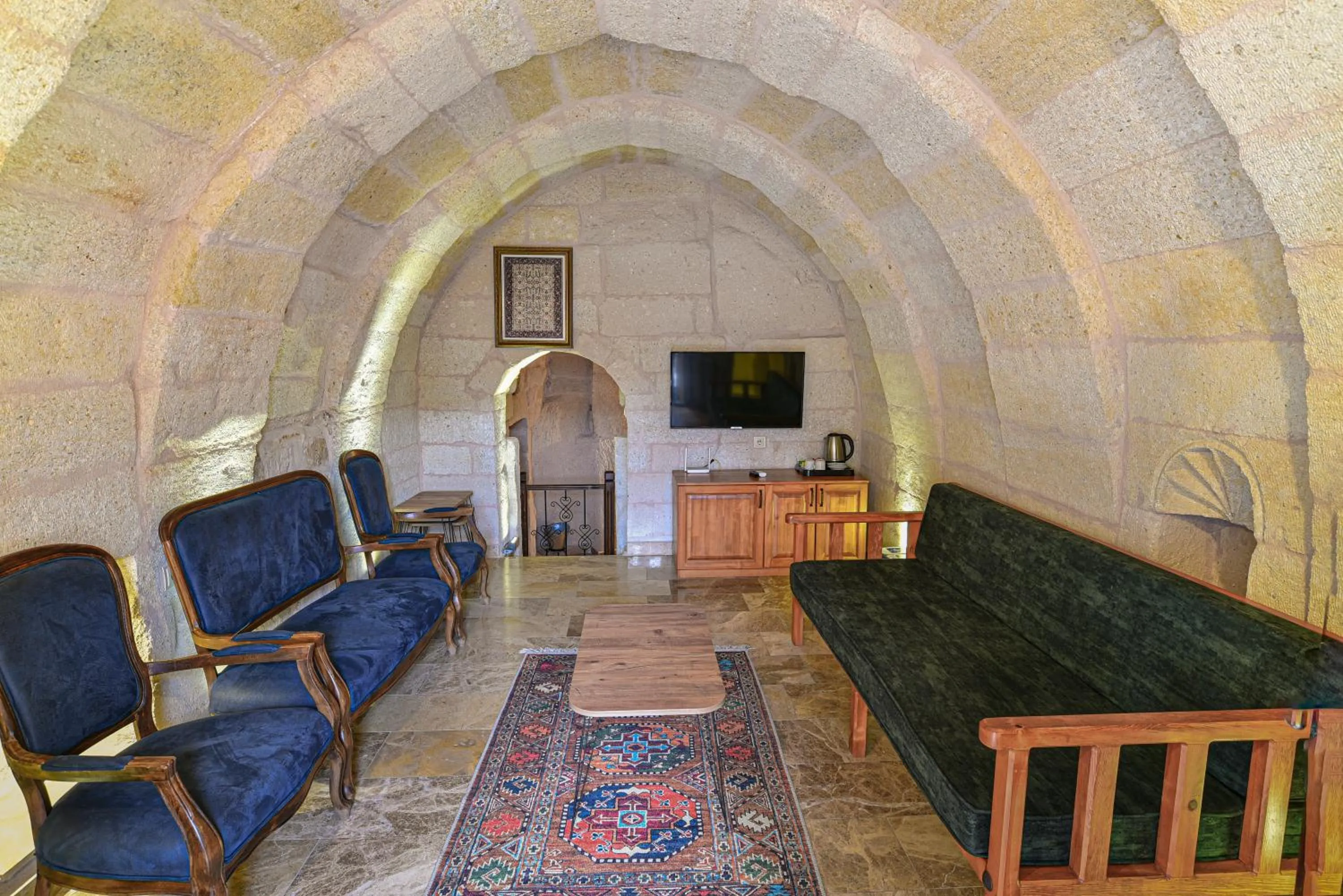 Communal lounge/ TV room in Dervish Cave House & Restaurant