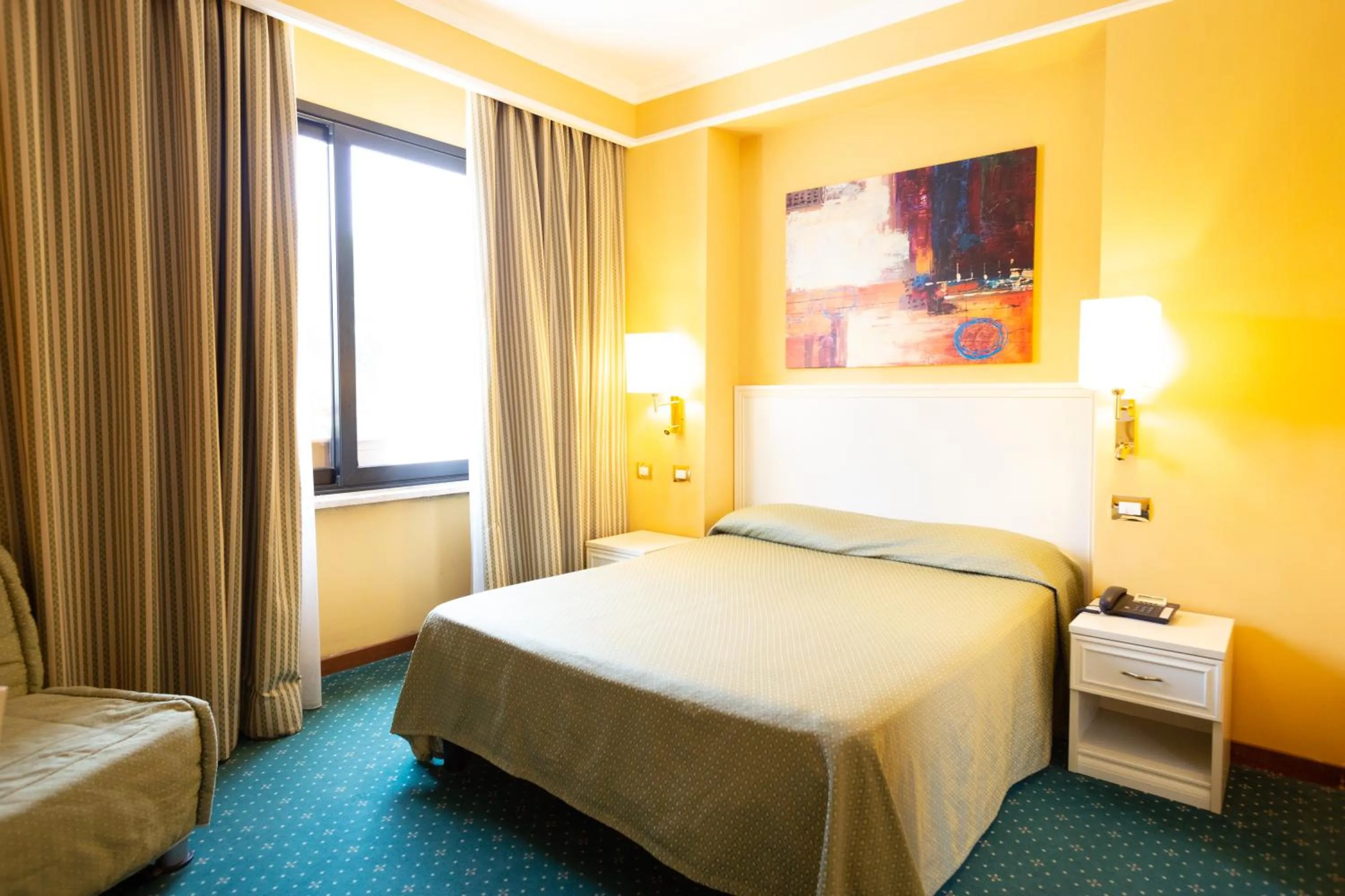 Bed in Cervara Park Hotel