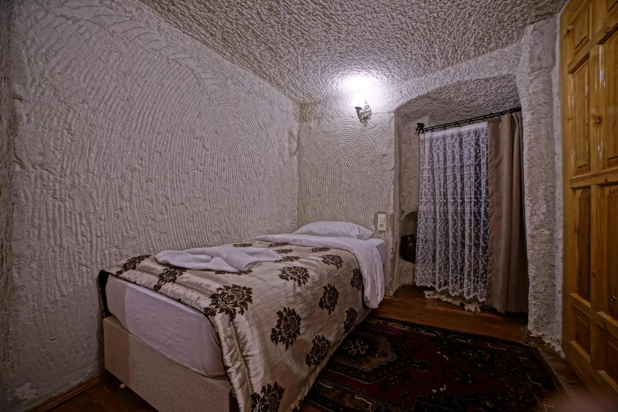 Bed in Melek Cave Hotel