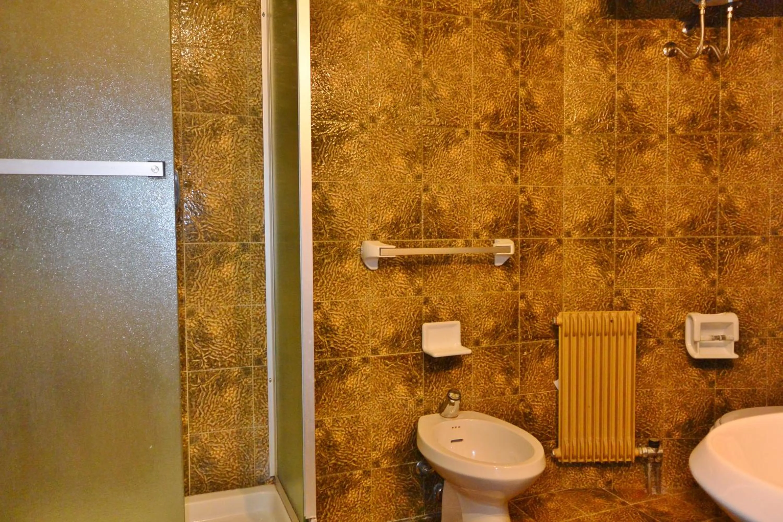 Bathroom in Appartamenti La Maison de Vacances