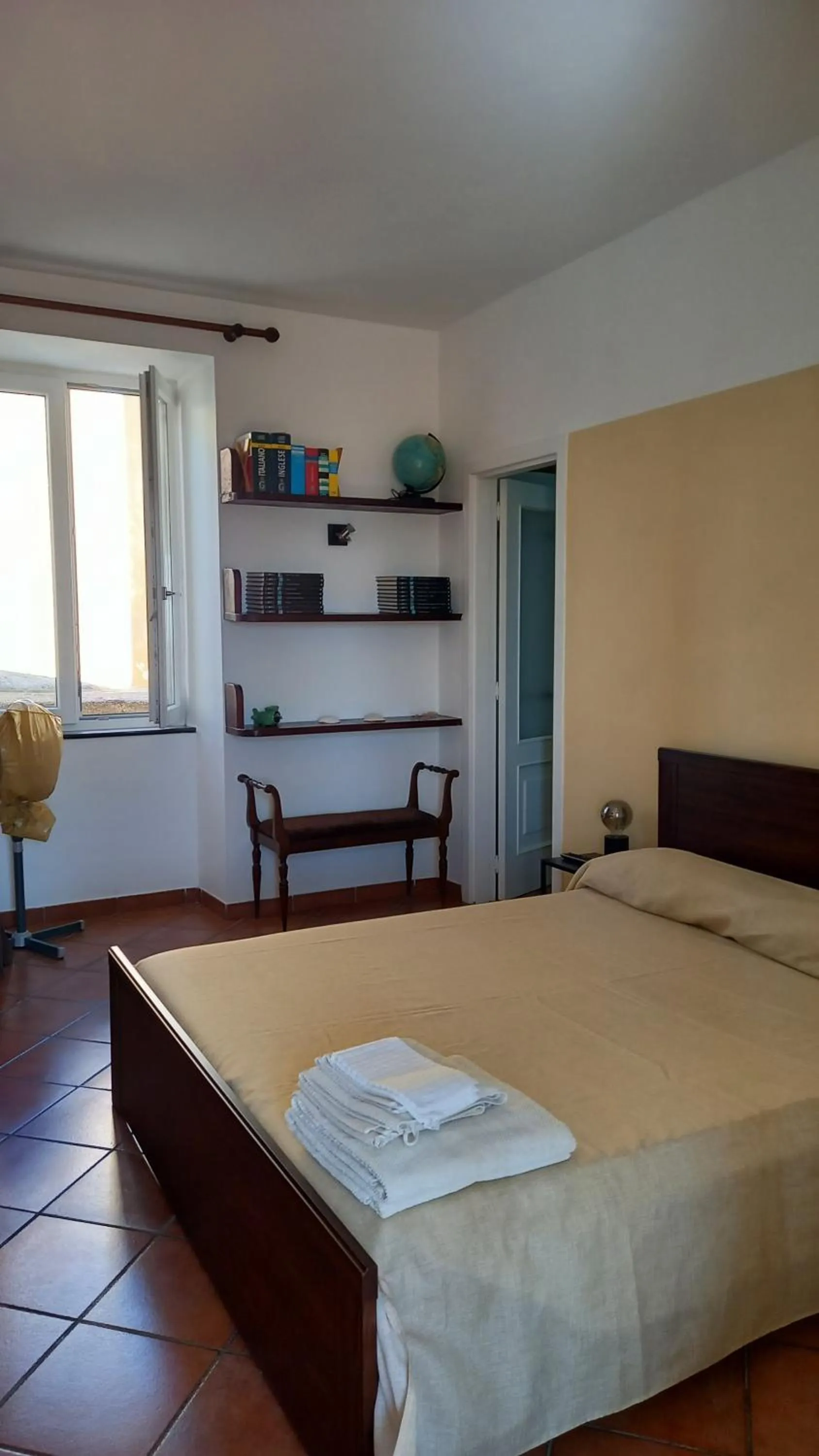 Photo of the whole room, Bed in La Casa Del Sole