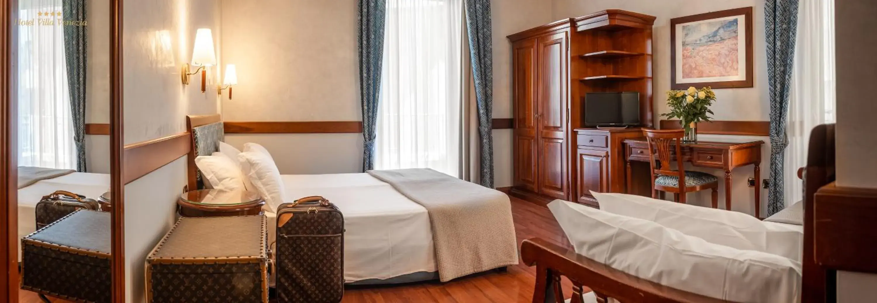 Triple Room in Hotel Villa Venezia Triple Room in Hotel Villa Venezia