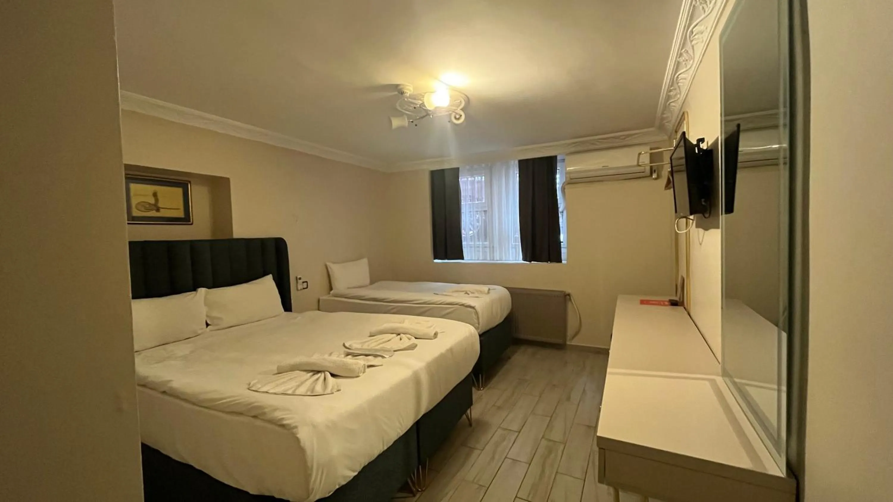 Bed in Hotel Tulip House