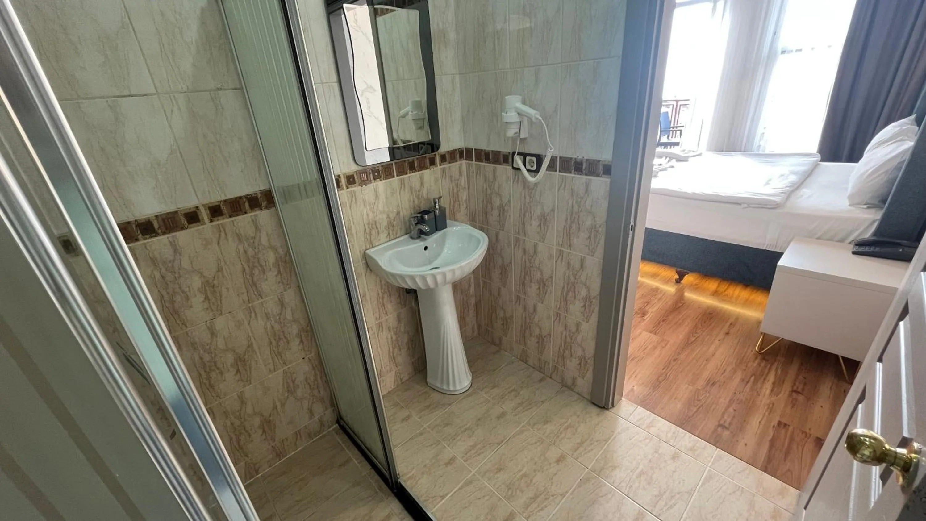 Bed in Hotel Tulip House