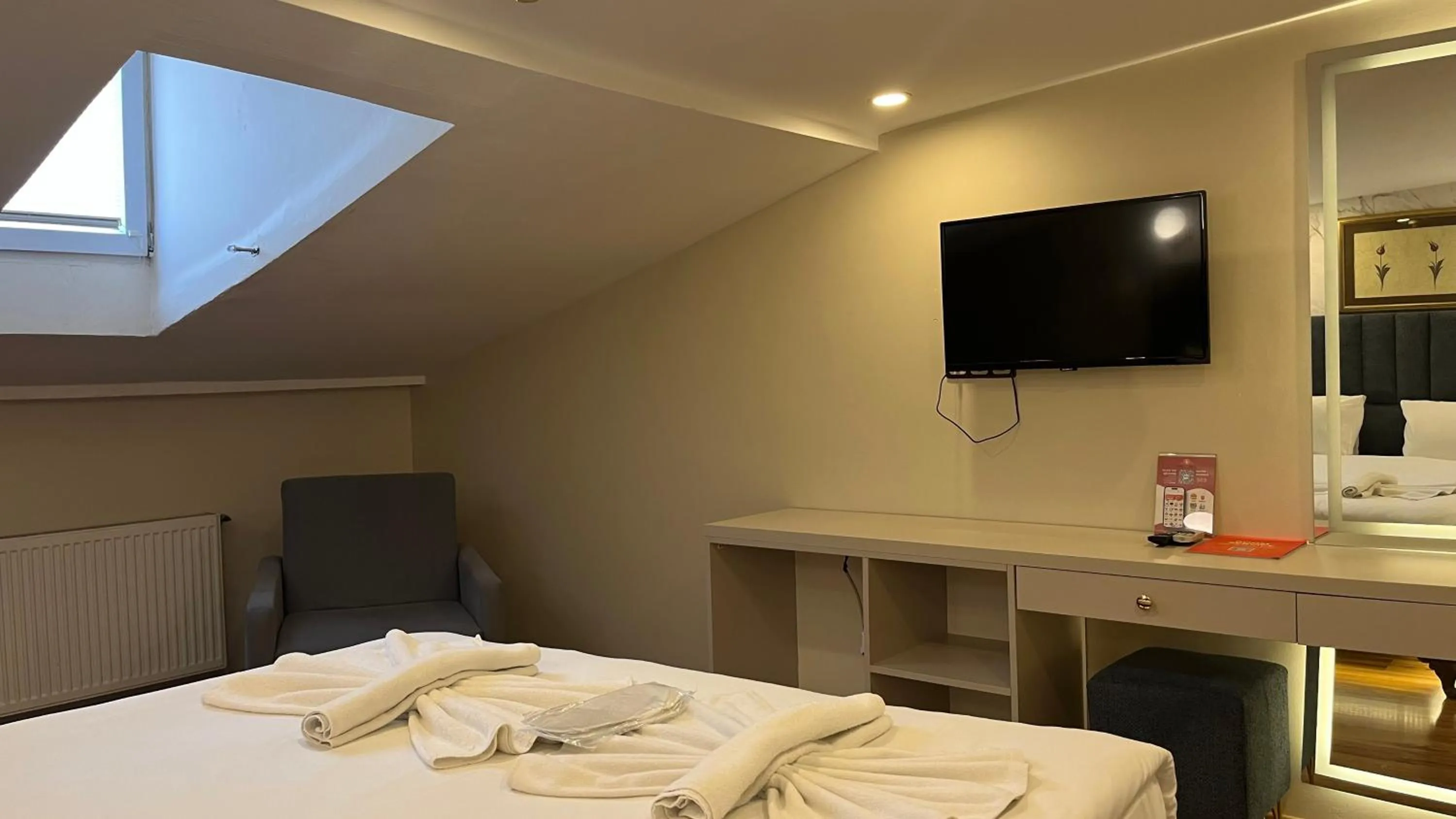 Bed in Hotel Tulip House