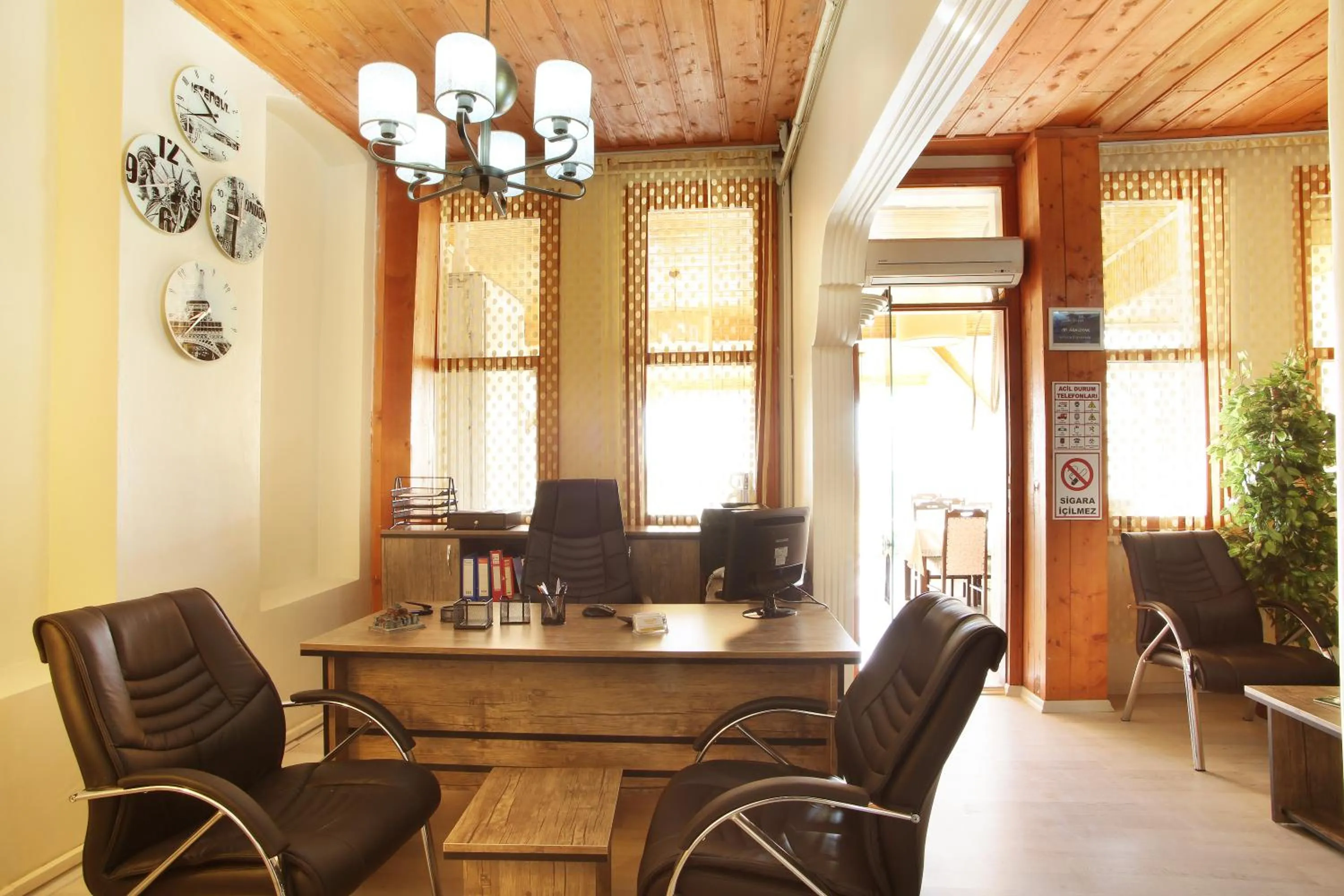 Communal lounge/ TV room in Theodian Hotel