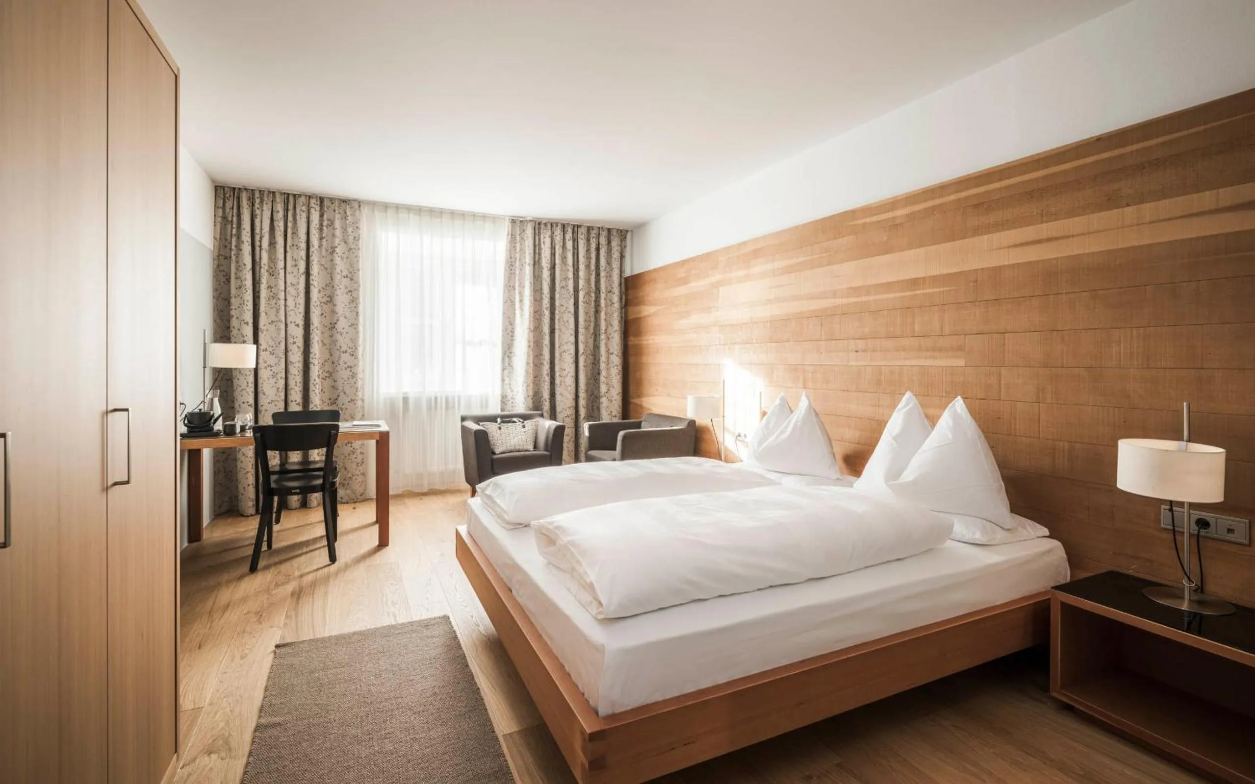 Photo of the whole room, Bed in Boutique & Gourmet Hotel Orso Grigio - Grauer Bär