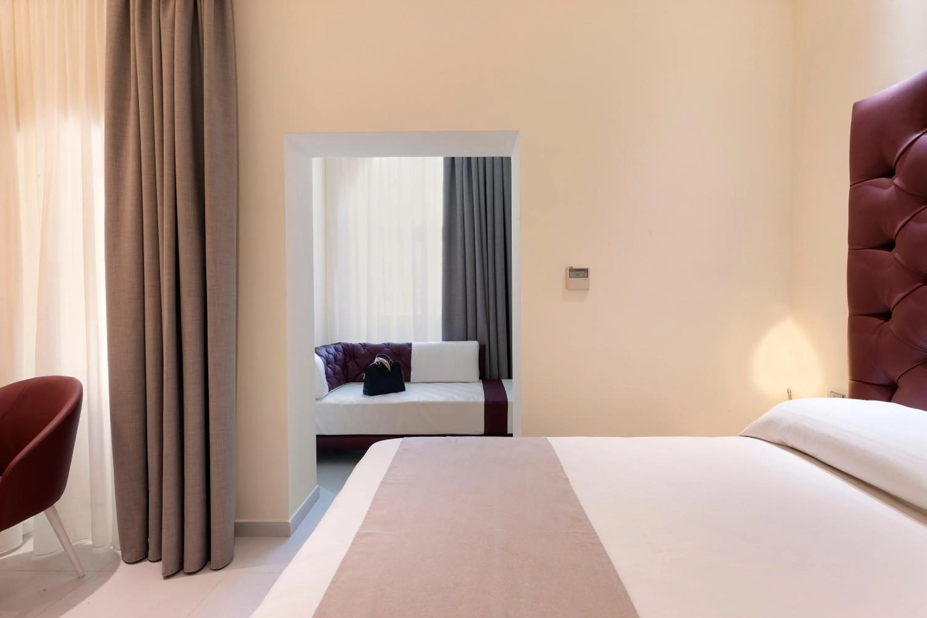 Communal lounge/ TV room, Bed in Palazzo Tritone & Abagnale