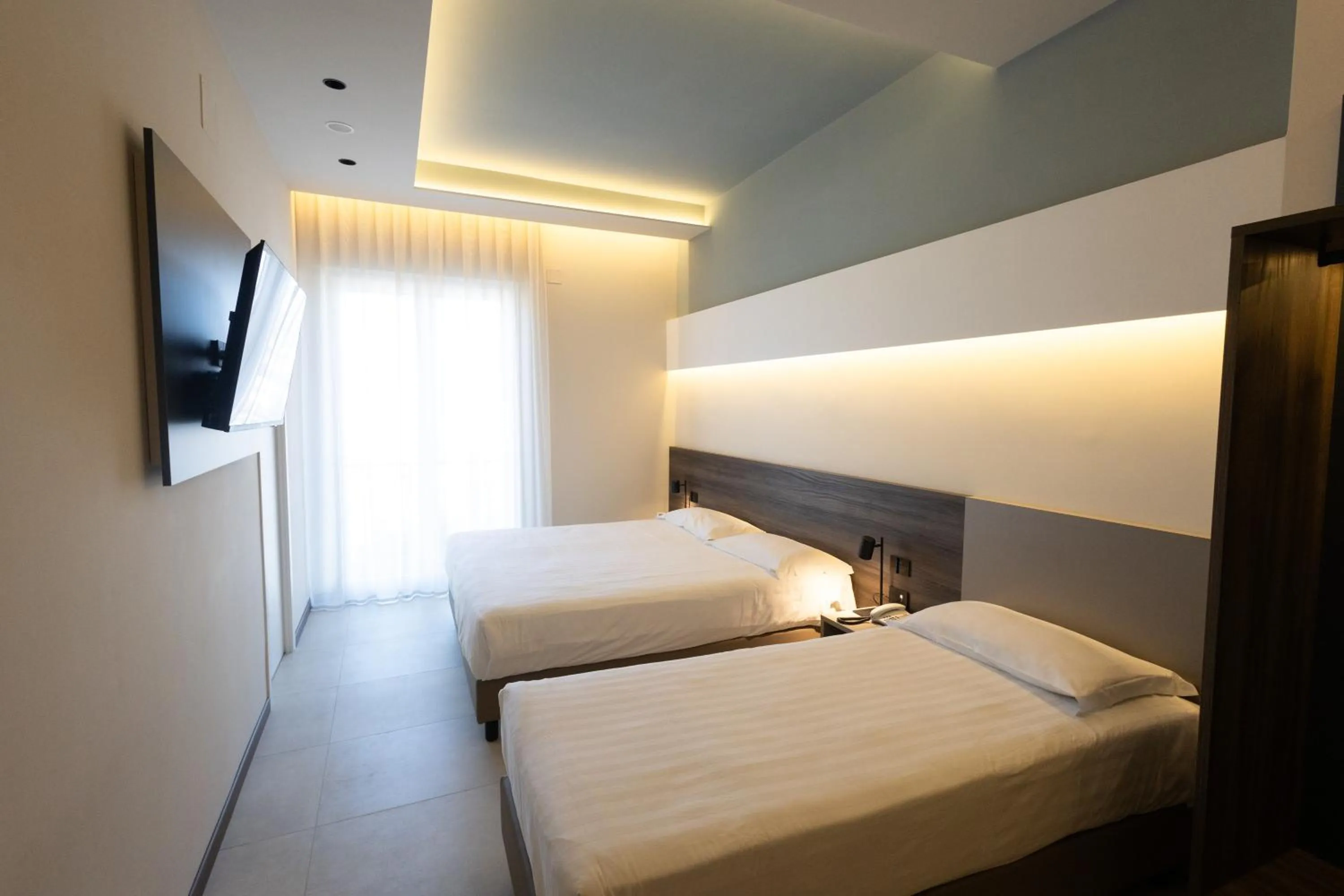 Family, Bed in Hotel Carosello