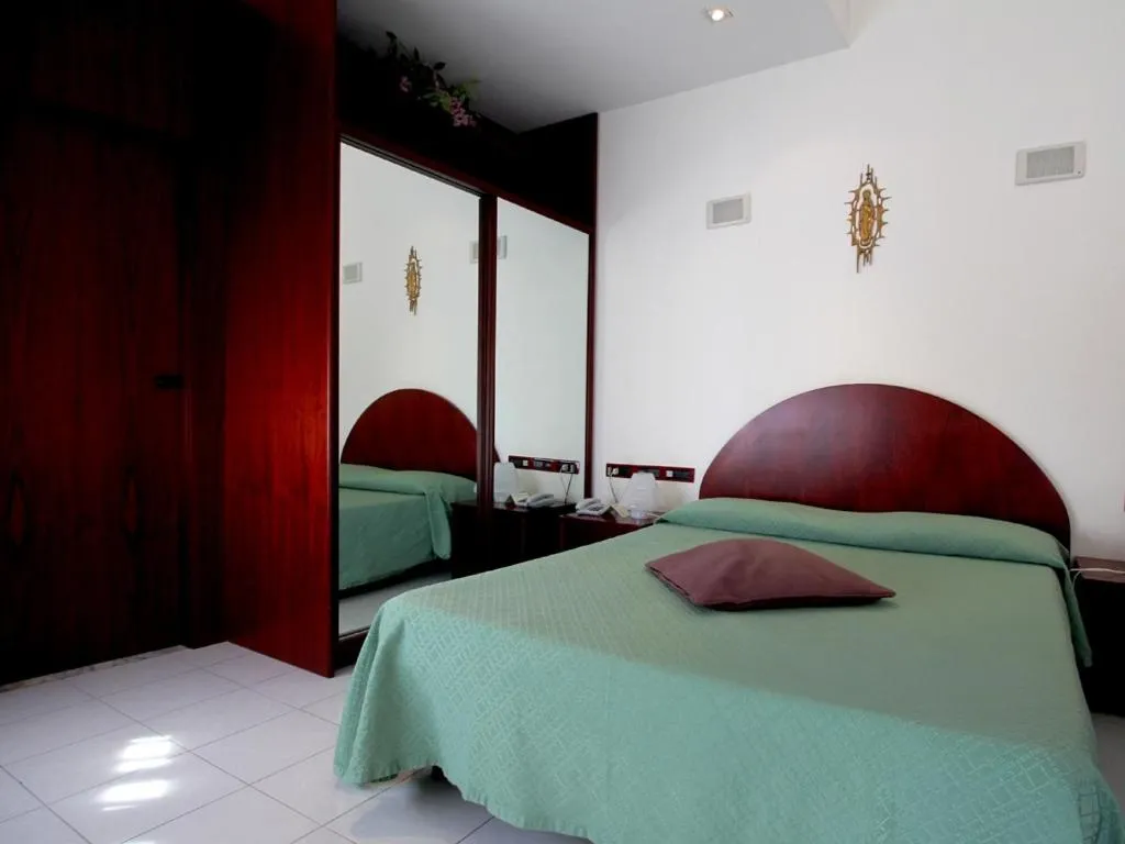 Bed in Hotel Carosello