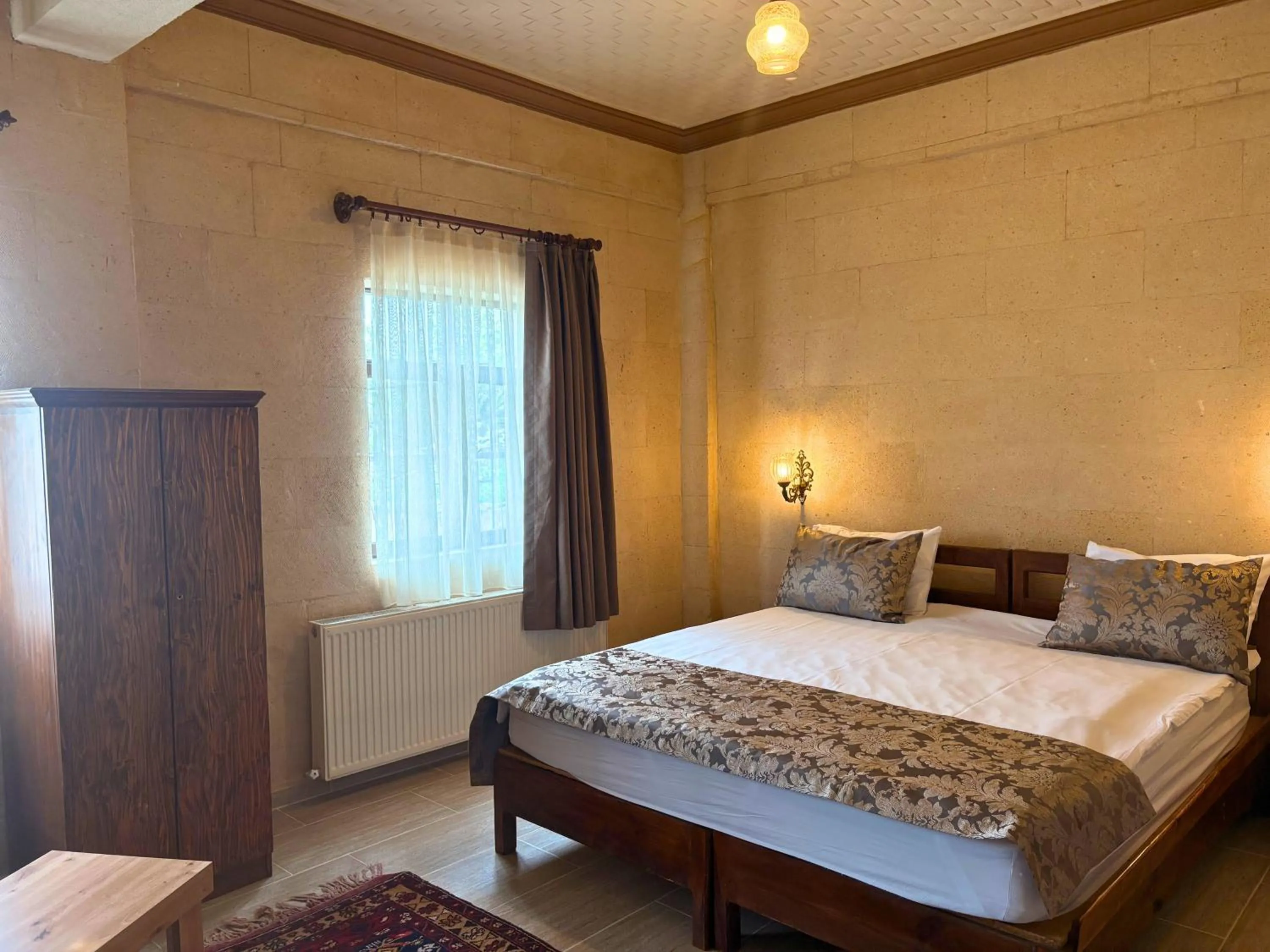 Bed in Elysee Cave House