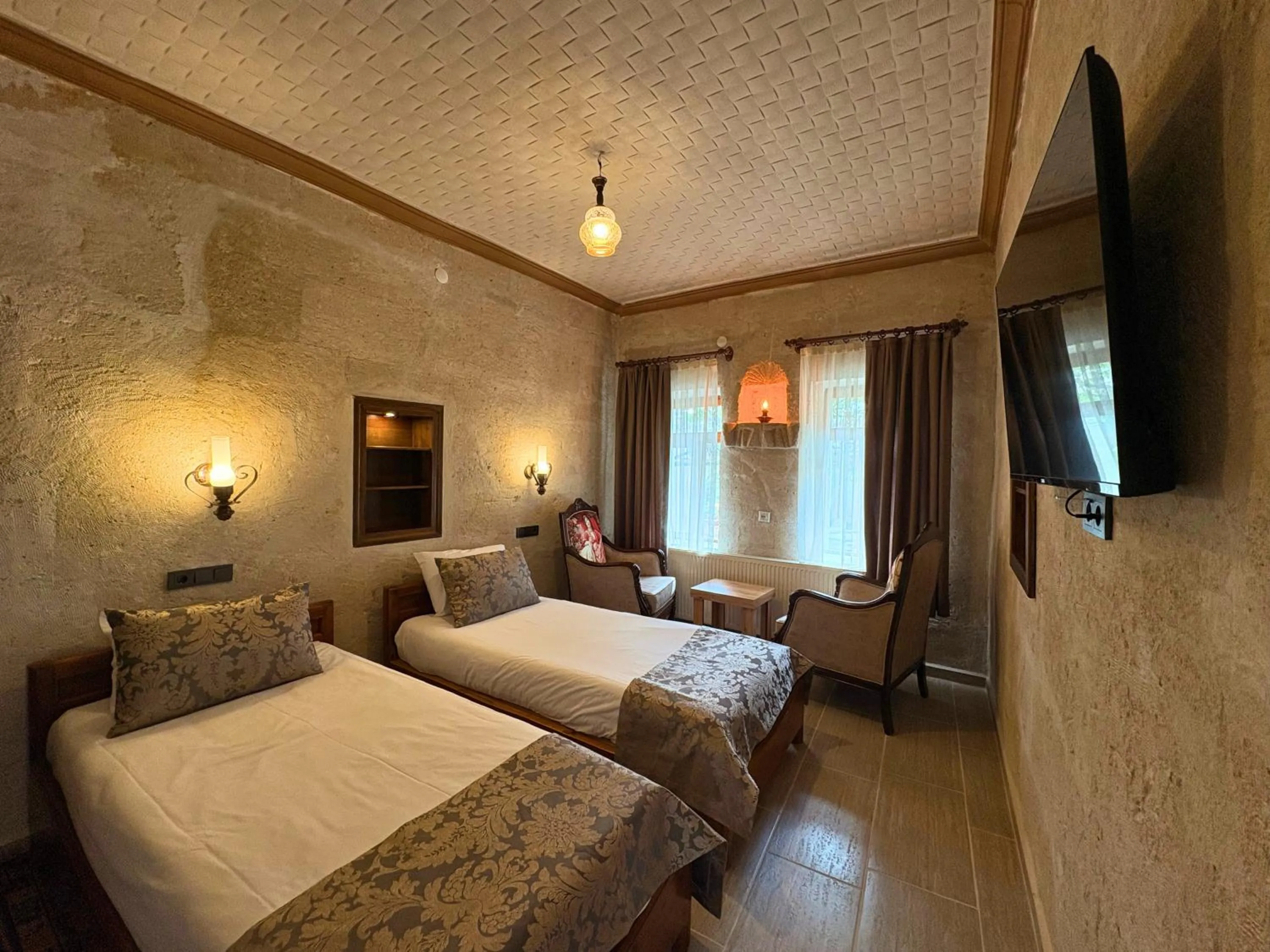 Bed in Elysee Cave House