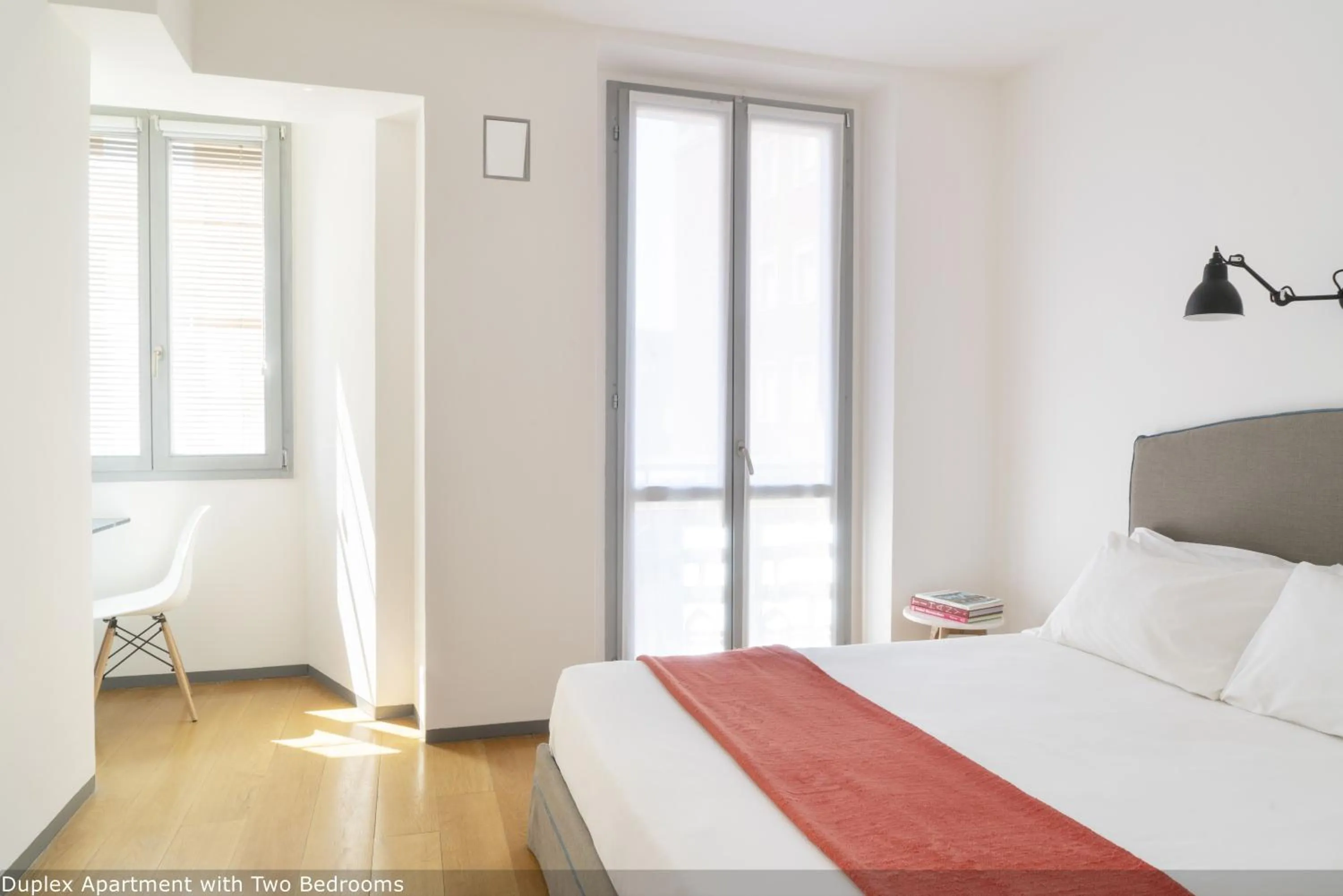 Bed in Brera Apartments in San Fermo