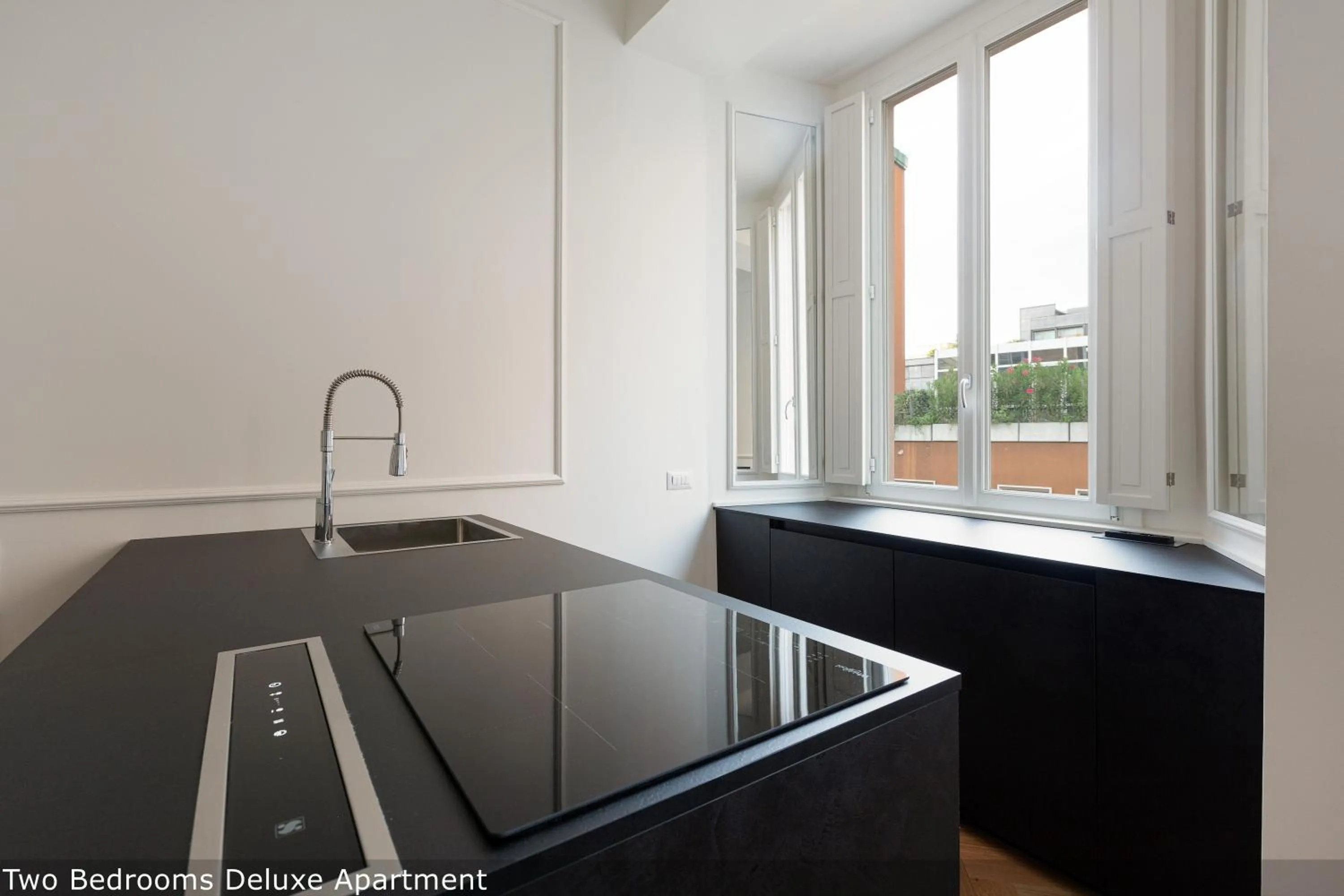 Kitchen or kitchenette in Brera Apartments in San Fermo